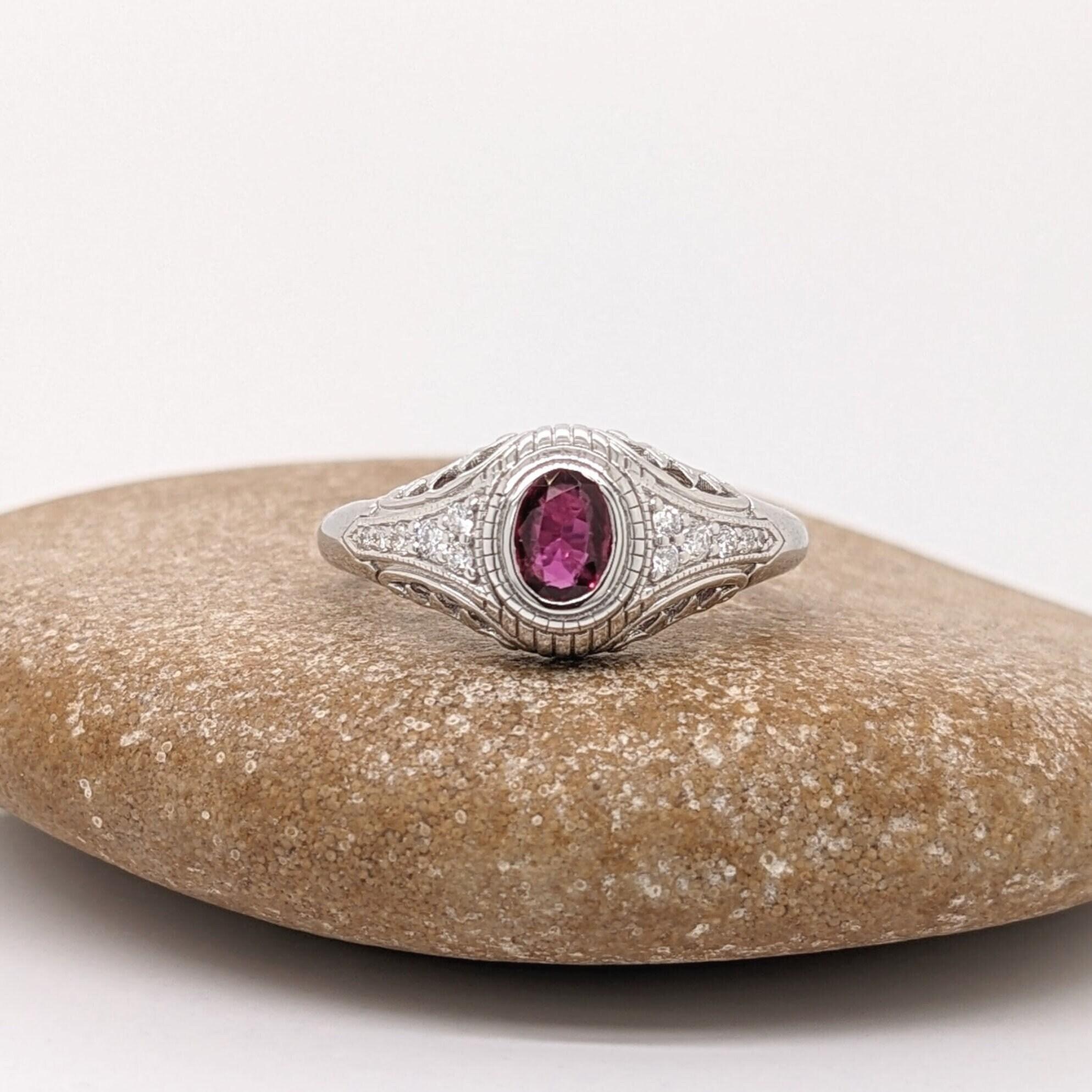 This vintage inspired ring features a bezel set 0.32 carat oval ruby with natural earth mined diamonds, all set in solid 14K gold. This ring can be a beautiful July birthstone gift for your loved ones!

**We offer complimentary resizing, message us