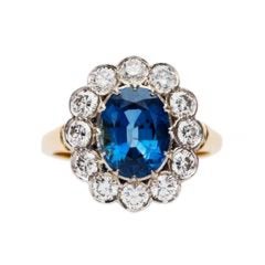 Vintage Inspired Sapphire and Diamond Mixed Metal Engagement Ring