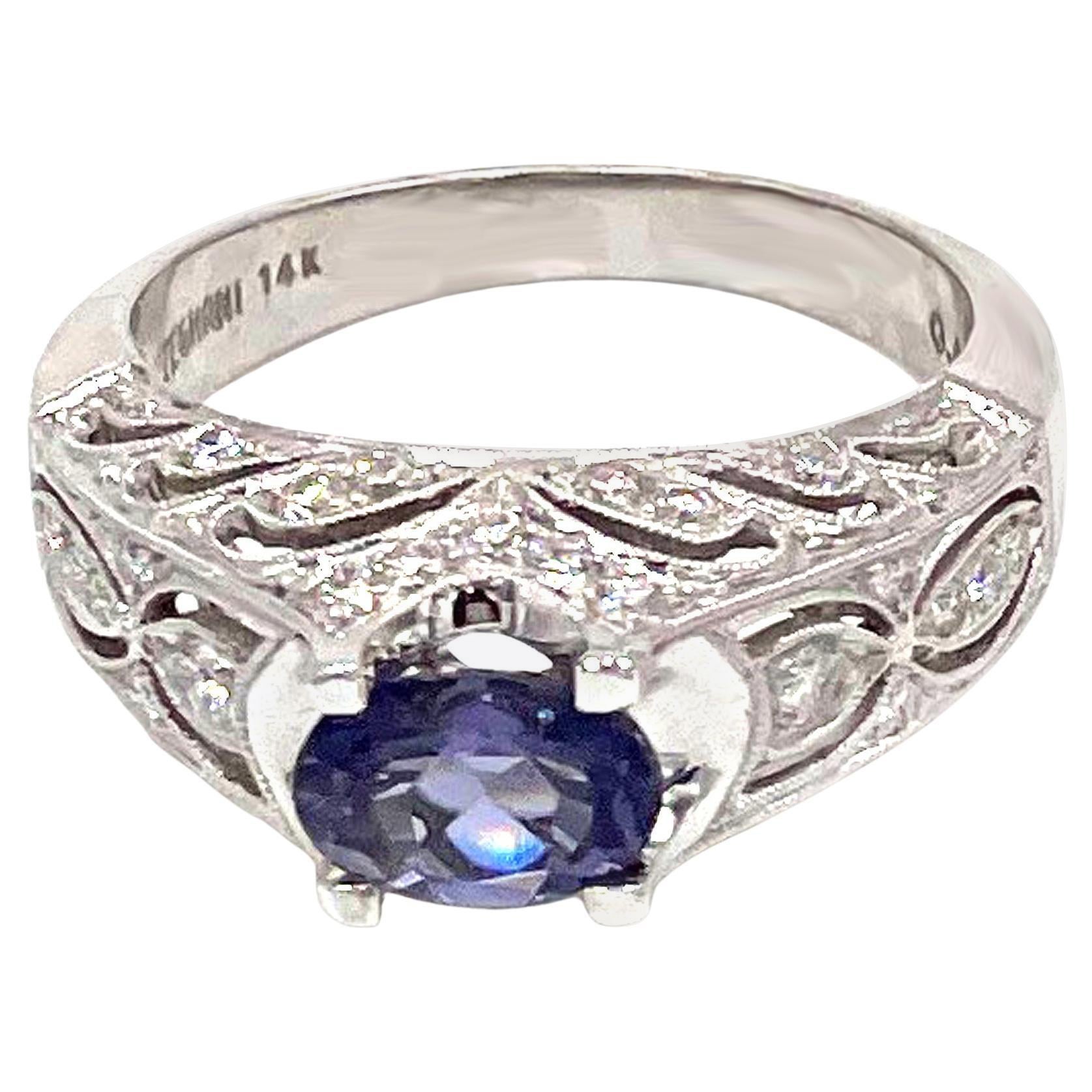 Vintage Inspired Solitaire Ring in 14K White Gold with Oval Iolite and Diamonds For Sale