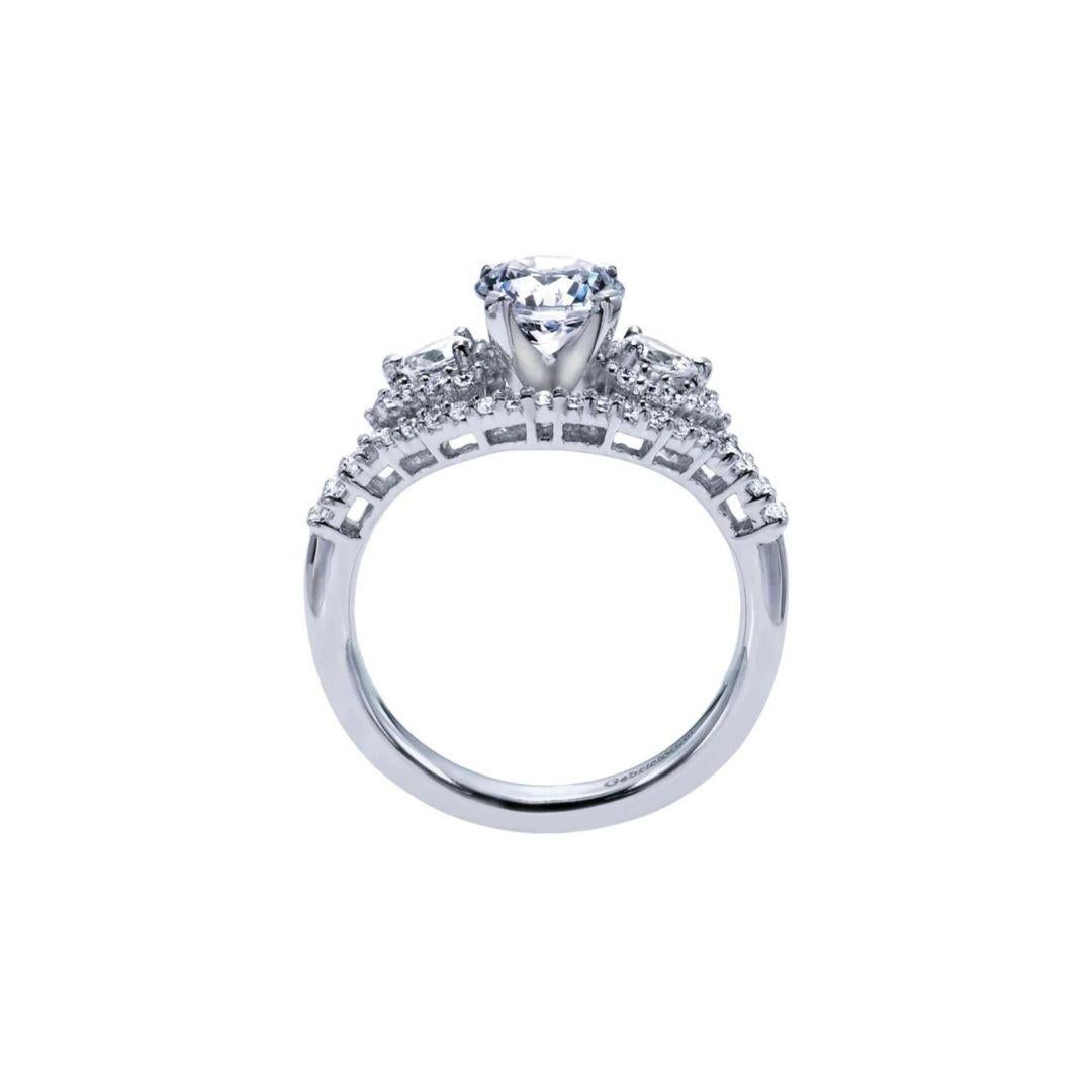 Ladies' 14k White Gold Diamond  Engagement Mounting﻿. Diamond pave on the ring's shank extends to the sides of the center stone to give this one of a kind ring a romantic vintage appeal. Center diamond NOT included. Side diamonds 0.50 ctw, H color,