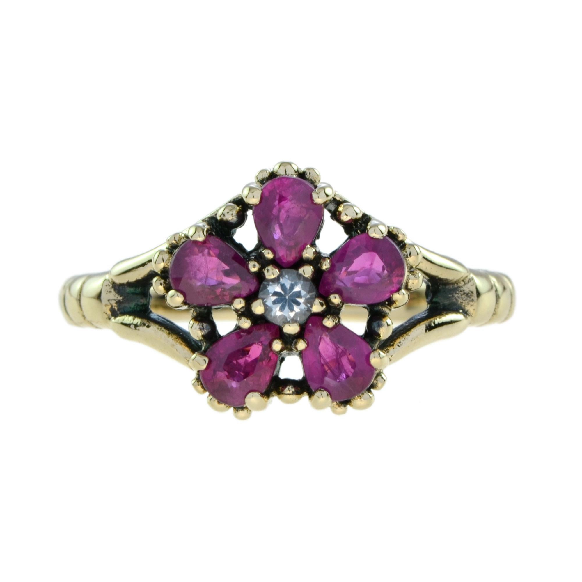 Vintage white sapphire and ruby ring is a classic design that would be a wonderful addition to your fine jewelry collection. A perfect piece to wear all year long, and the floral motif would be wonderful this season with a beautiful spring or summer