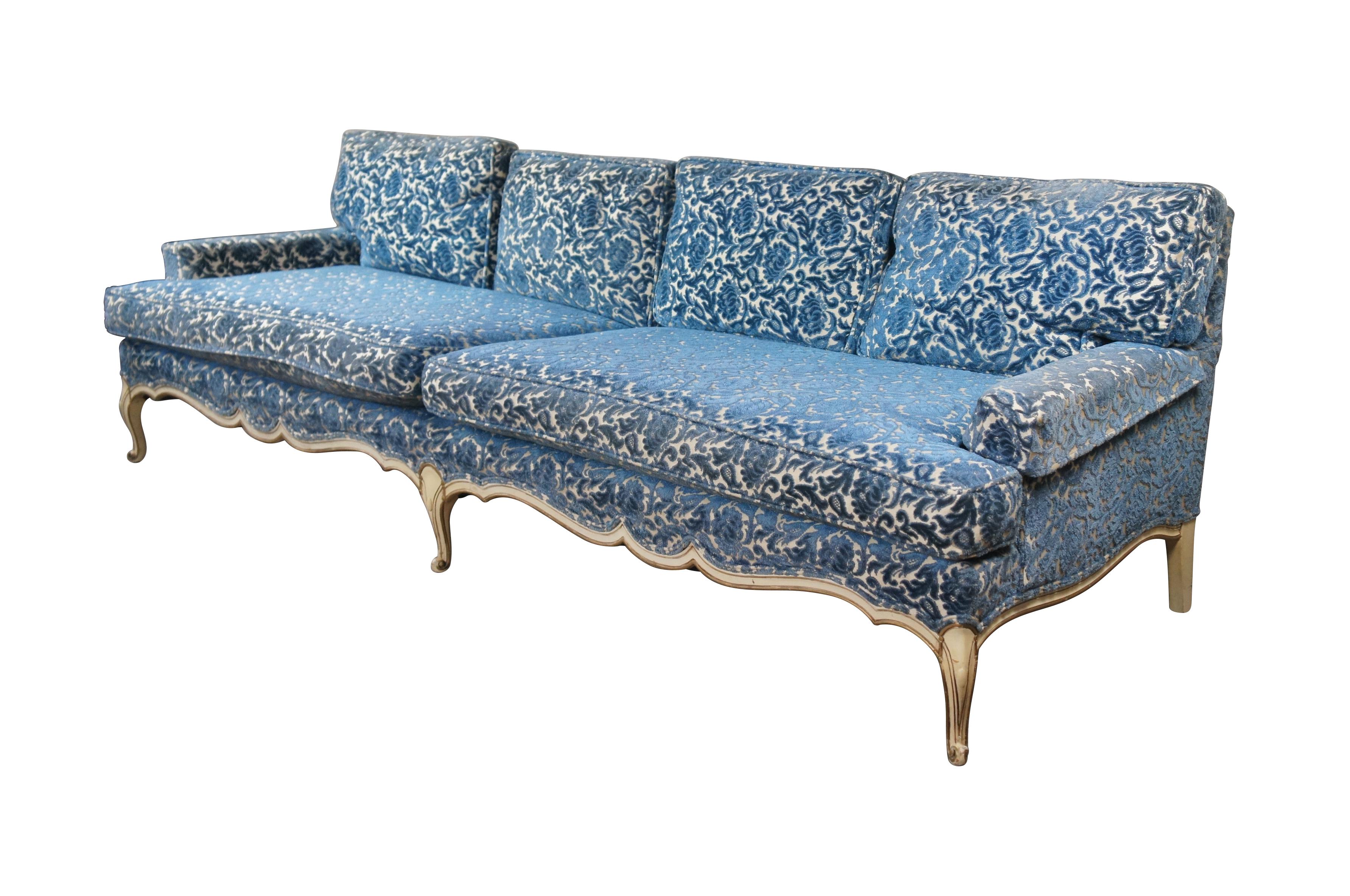 Retro Mid Century French Provincial day sofa by Interior Crafts.  Features scalloped frame with cabriole legs and raised blue velvet upholstery with duck down filled back cushions.

Dimensions:
34