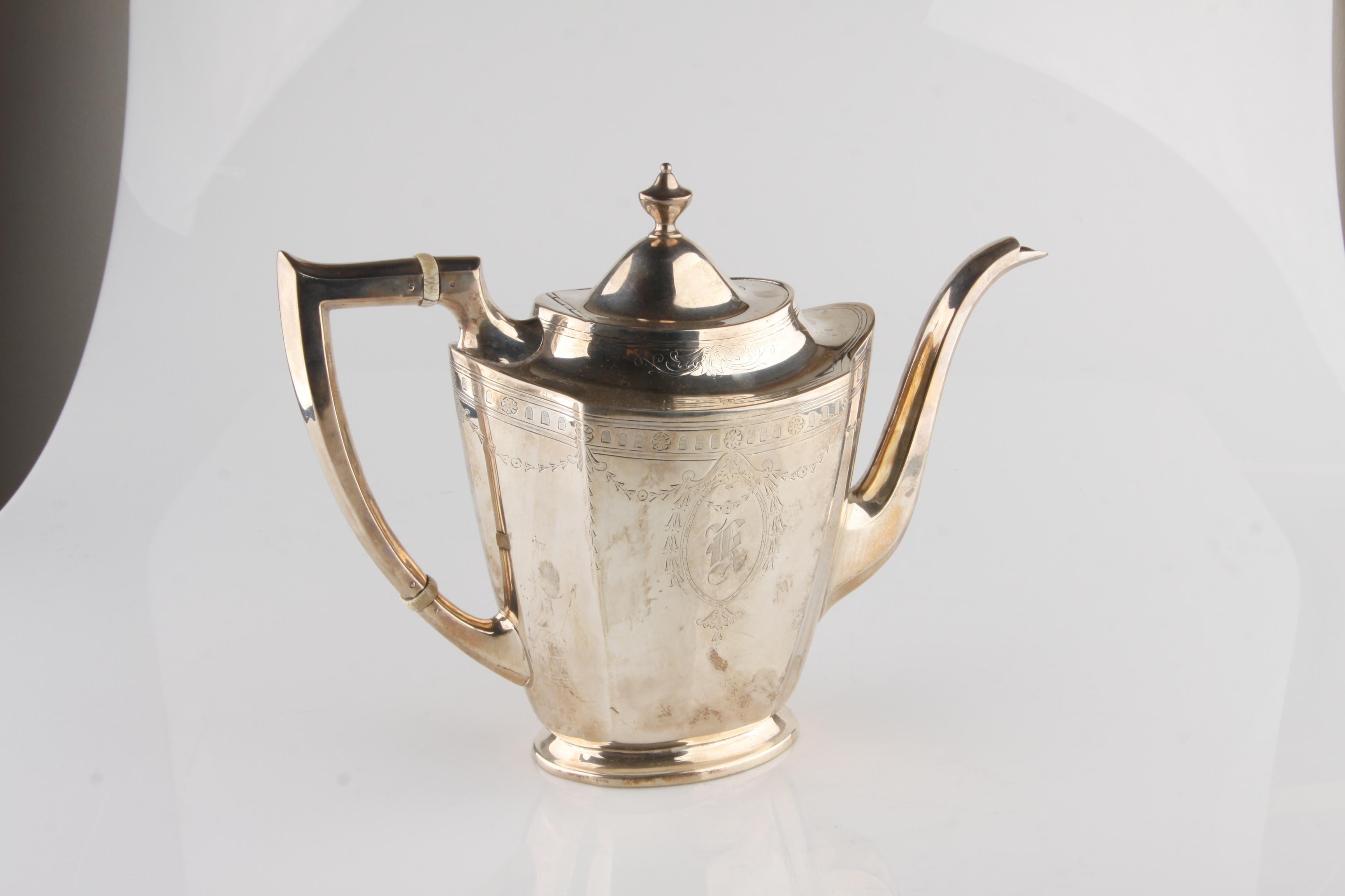 International Silver Company Coffee pot & Sugar Bowl
bowl with Lid Engraved with classic branches and leafs
Made In the USA 
CIRCA:  1940'S
PATTERN: #306
SIZE: 
 Coffee Pot 6 3/4