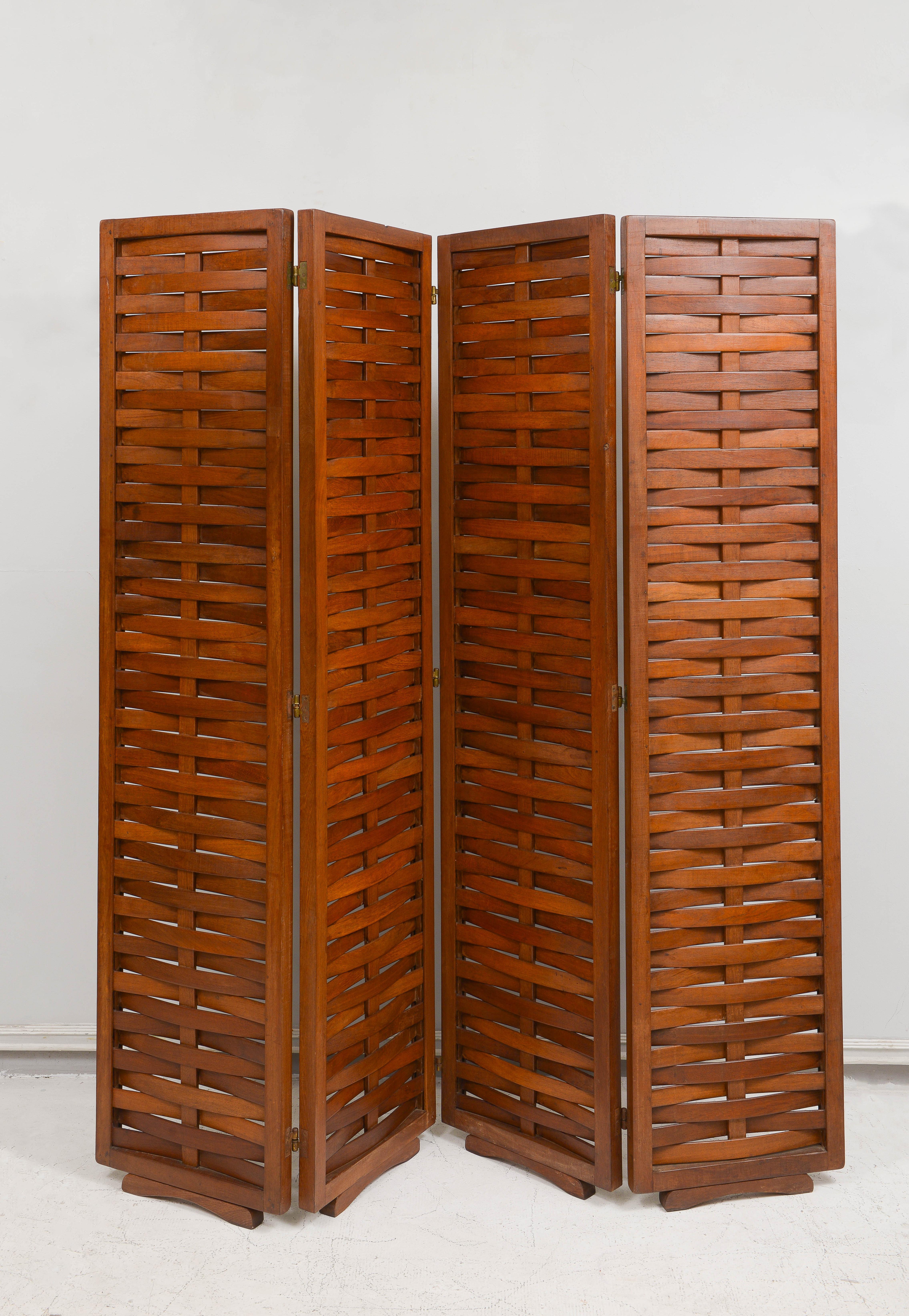 Intricately designed vintage mahogany four panel screen with interwoven design.
Total Width when fully extended is 64