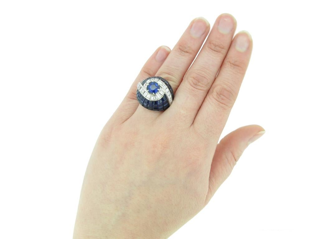 Antique Cushion Cut Vintage invisibly set sapphire and diamond ring, circa 1950. For Sale