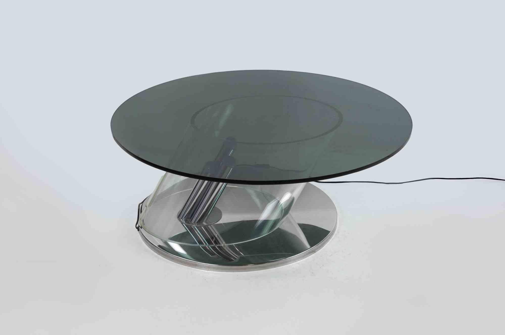 Tavolino illuminato vintage realizzato da RIMA di Desio negli anni Settanta.

Acciaio cromato, plexiglass, cristallo colorato.

Condizioni eccellenti.

Rif. La Mia Casa n. 43, maggio 1972, p. 69. 