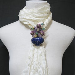 Spilla d'epoca IRADJ MOINI con fiori in vaso e gemme multicolore