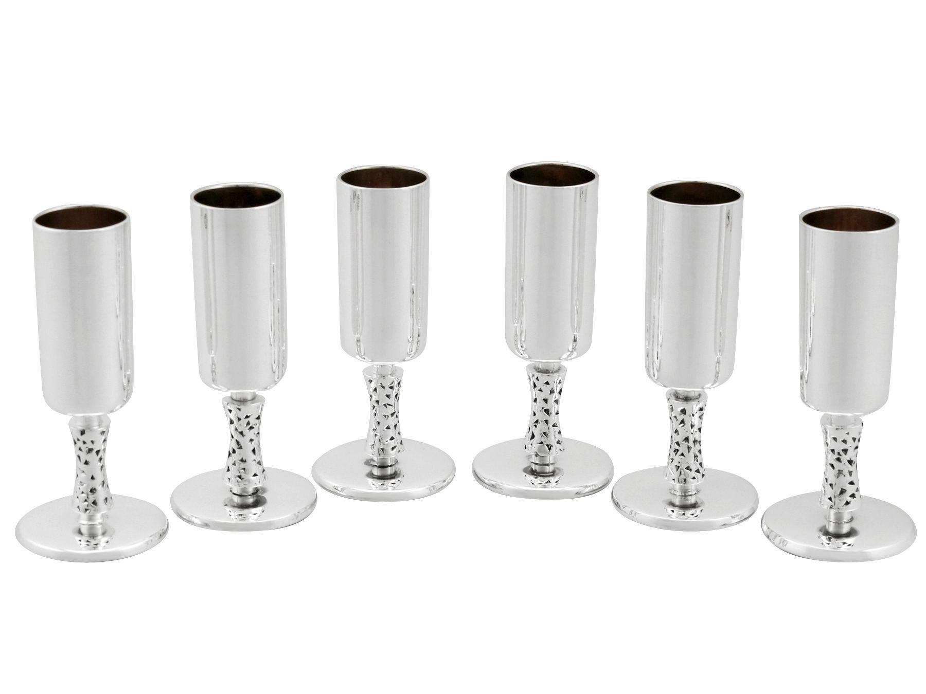 An exceptional, fine and impressive set of vintage Irish sterling silver sherry glasses - boxed; an addition to our range of wine and drink related silverware.

These exceptional vintage sterling silver sherry glasses/goblets have a plain