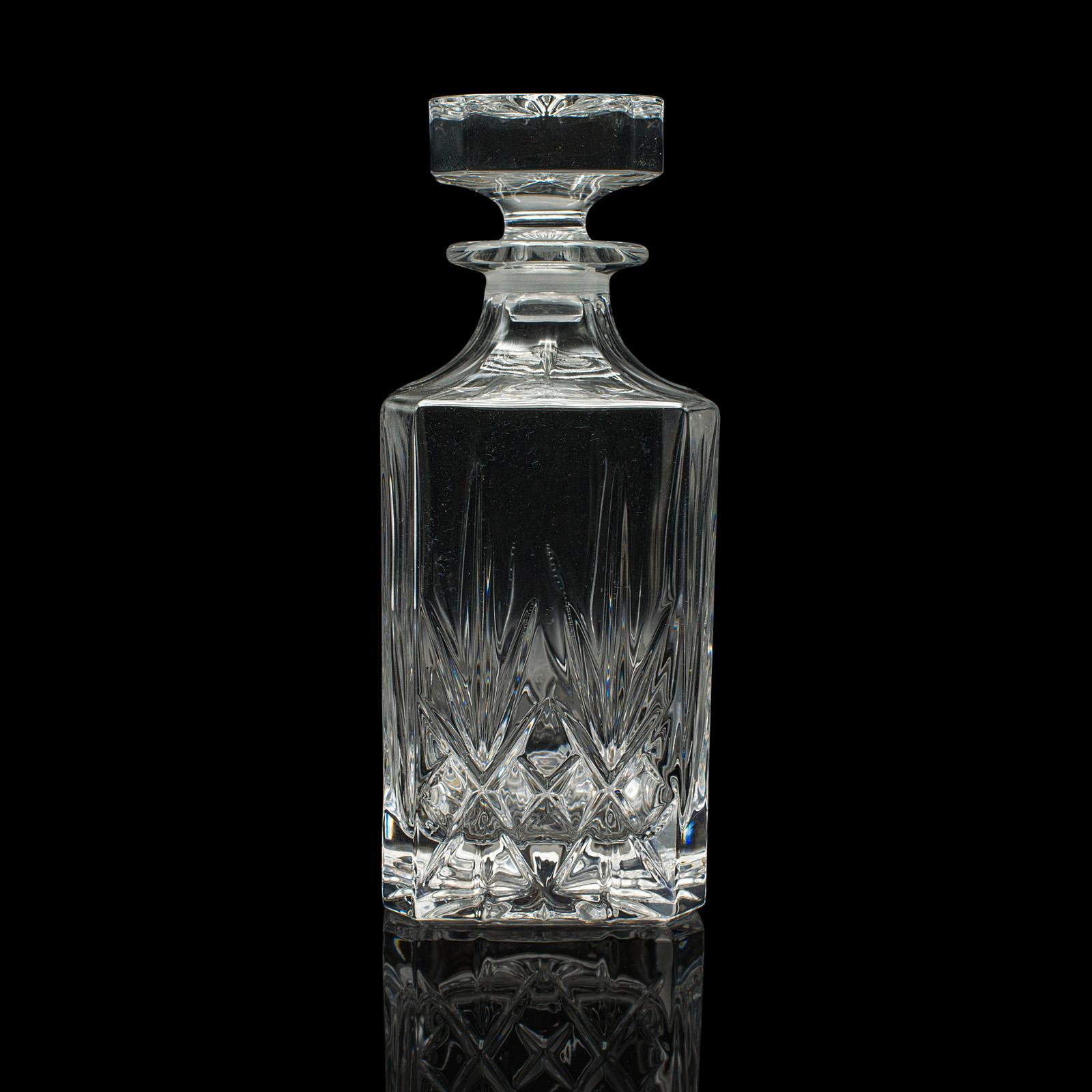 
This is a vintage Irish whiskey decanter. A cut crystal glass spirit or bourbon vessel, dating to the mid 20th century, circa 1960.

Pleasingly presented decanter in the traditional manner
Displays a desirable aged patina and in good original