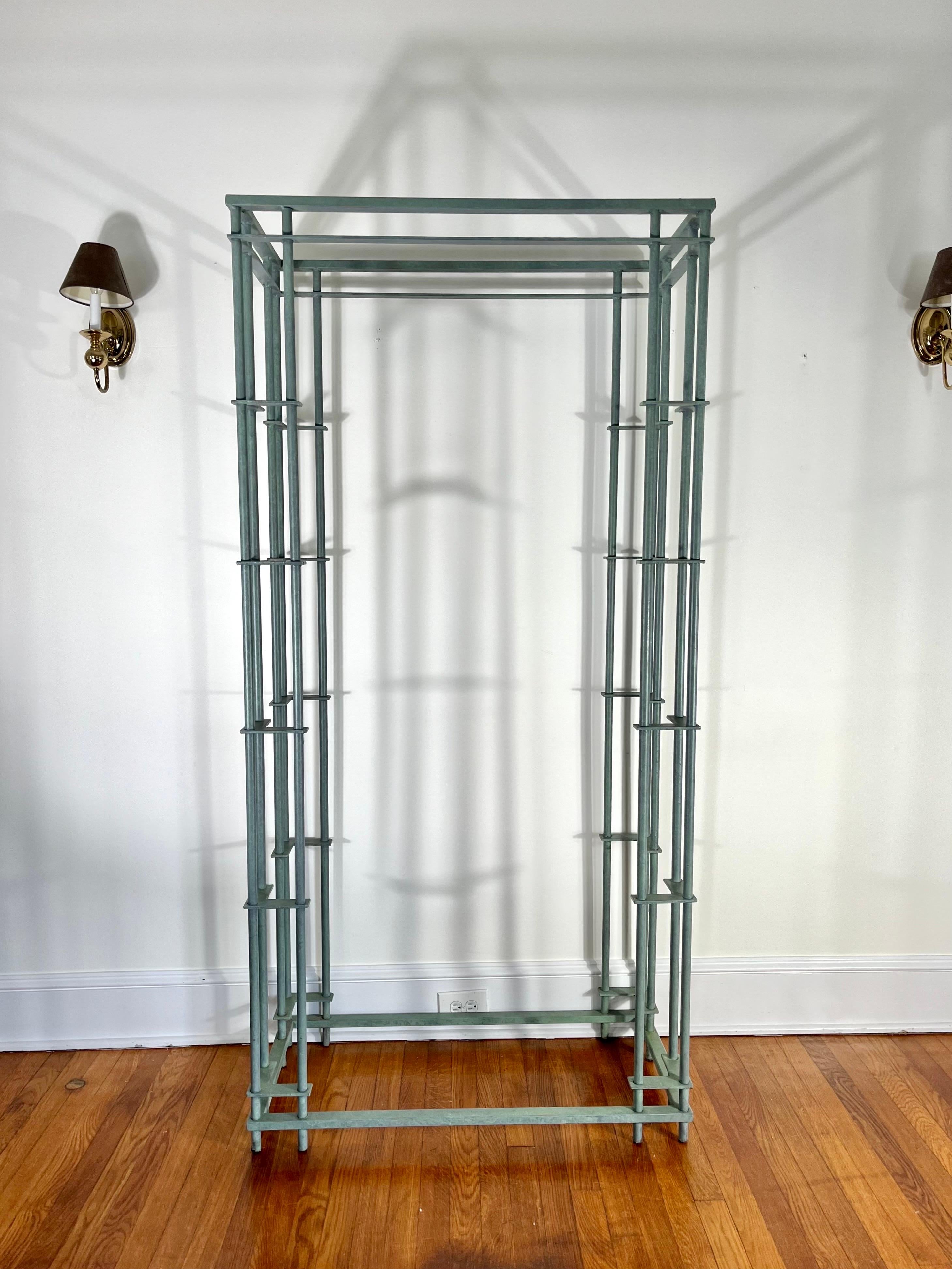 Fabulous Iron and Glass Etagere in the style of Walter Lamb. Aged patina finish with glass shelving. Striking angles with visual impact. 
Curbside to NYC/Philly $400