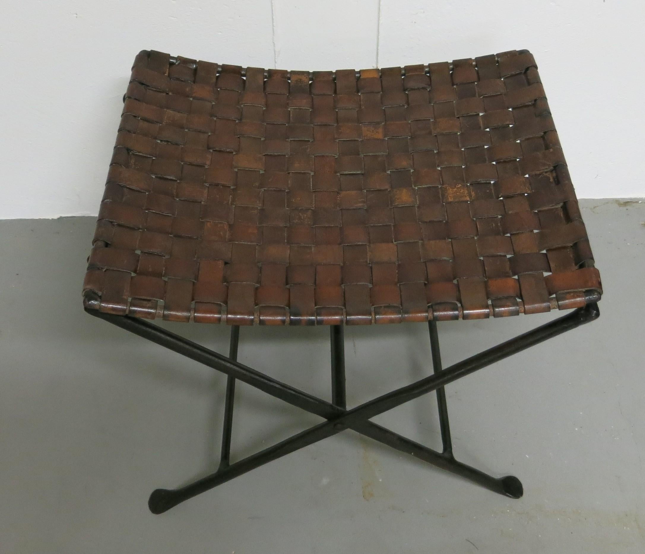 Vintage iron and leather folding stool. Measures: 20