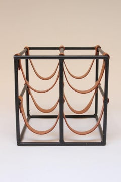 Porte-bouteilles vintage en fer et cuir d'Arthur Umanoff