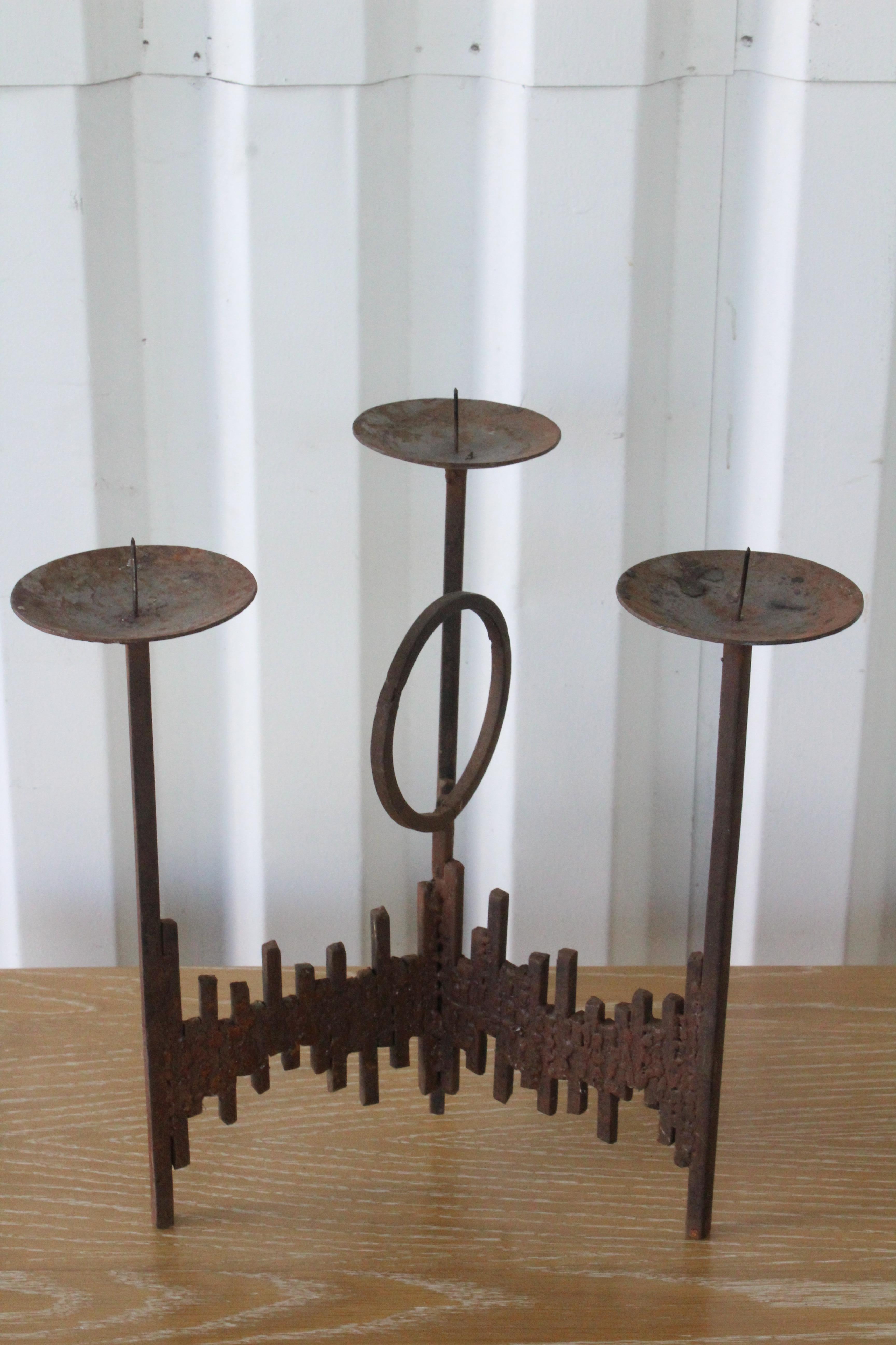 A vintage iron candelabra from France, 1960s. Original rusted patina.