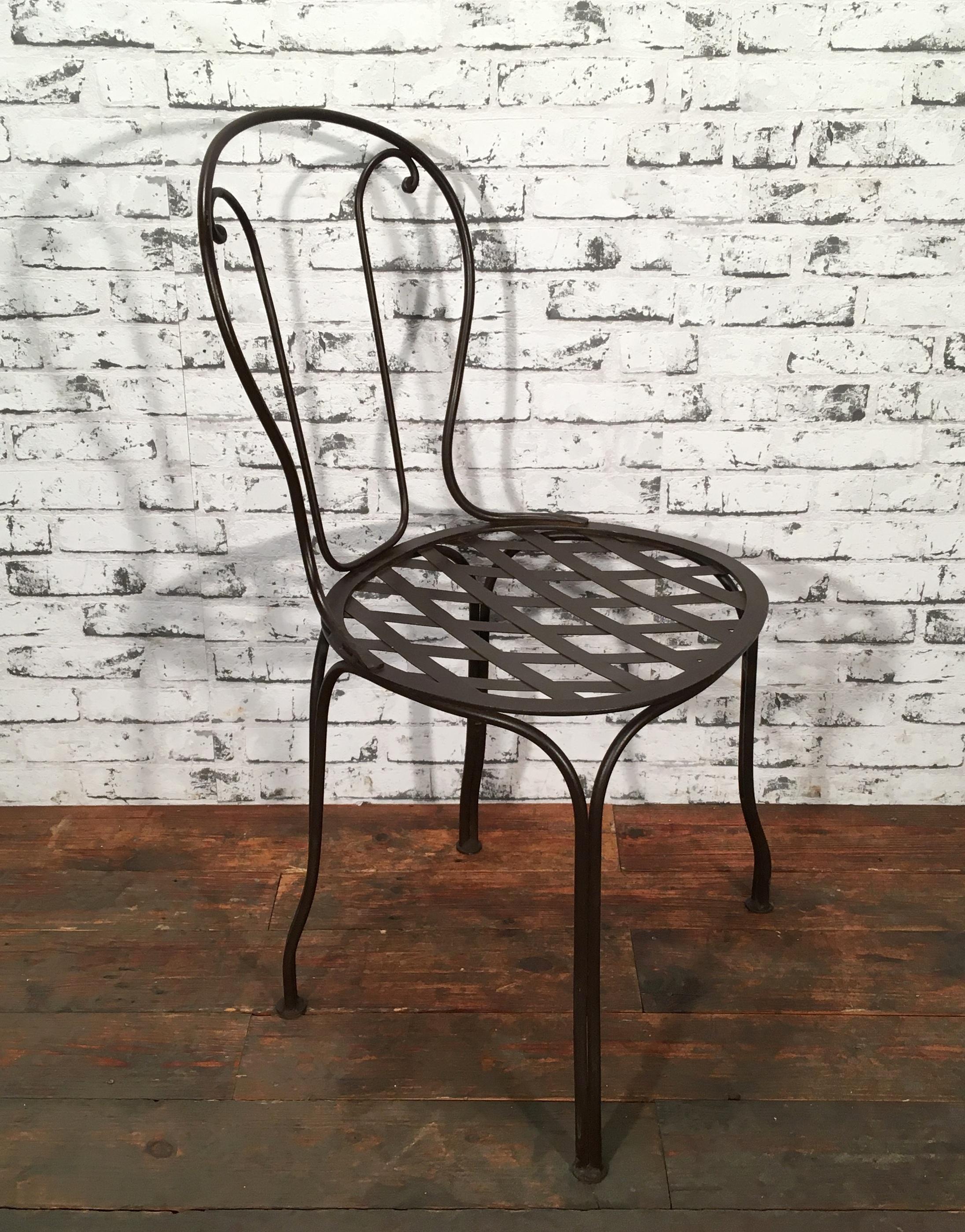 Vintage iron chair made by an art blacksmith during the 1930s.
Weight of the chair is 5 kg.
Dimensions of the seat: 41 x 39cm.