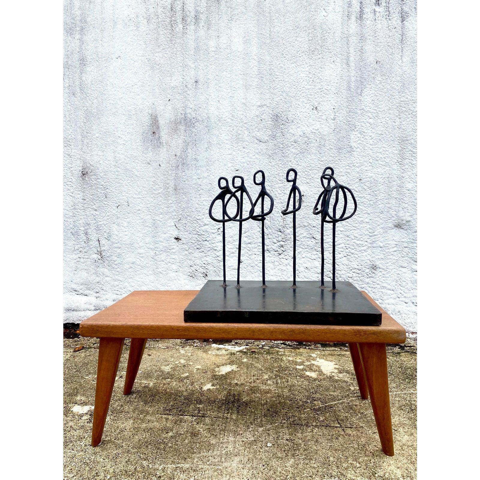 Incredible vintage original iron sculpture. An abstract composition of ring figures in a gathering. Beautiful and simple. Signed by the artist ACS. Acquired from a Hobe Sound estate.