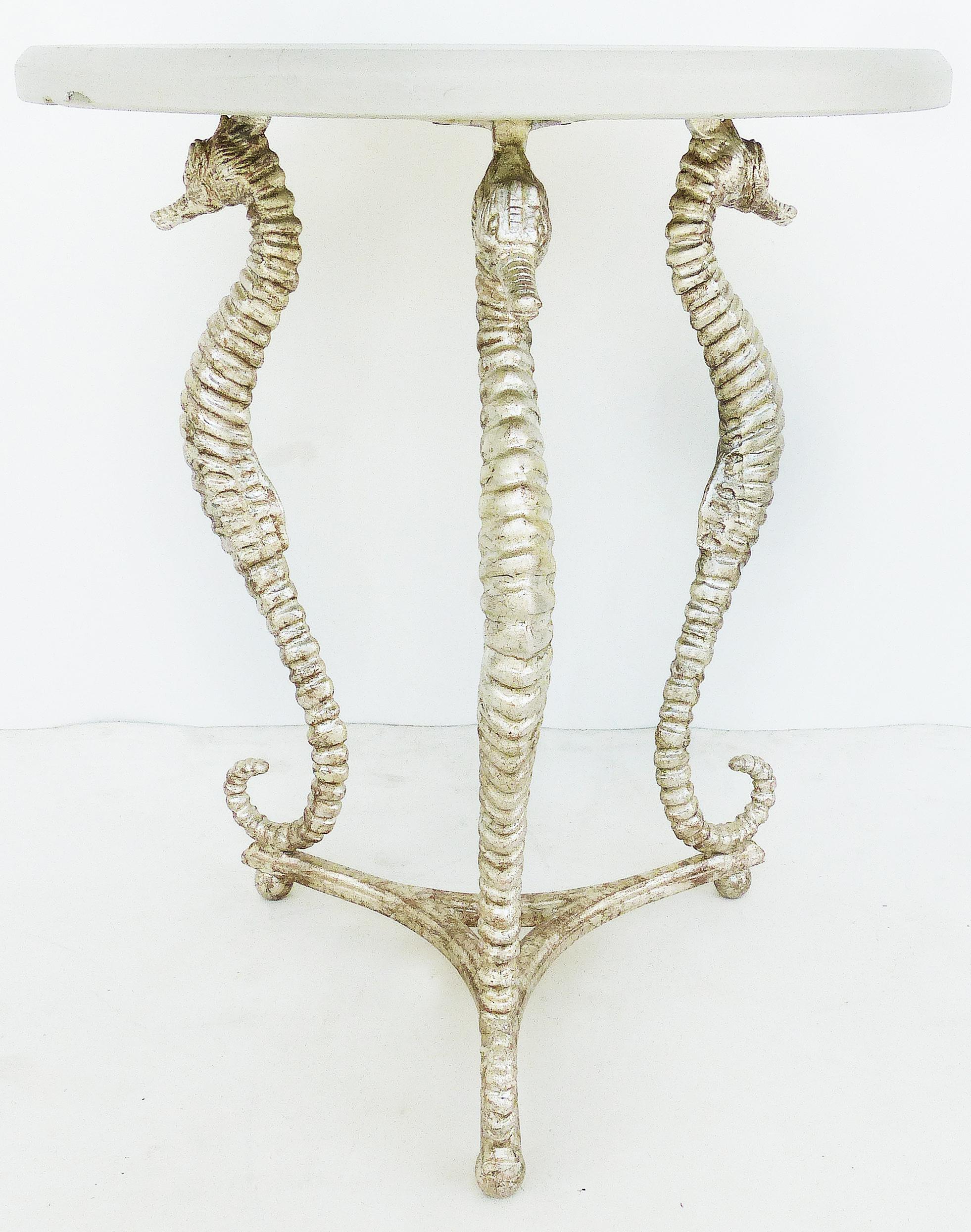 Vintage ironies seahorse silver-gilt side tables with cast stone tops

Offered for sale is a pair of side tables with cast stone tops and silver-gilt metal 