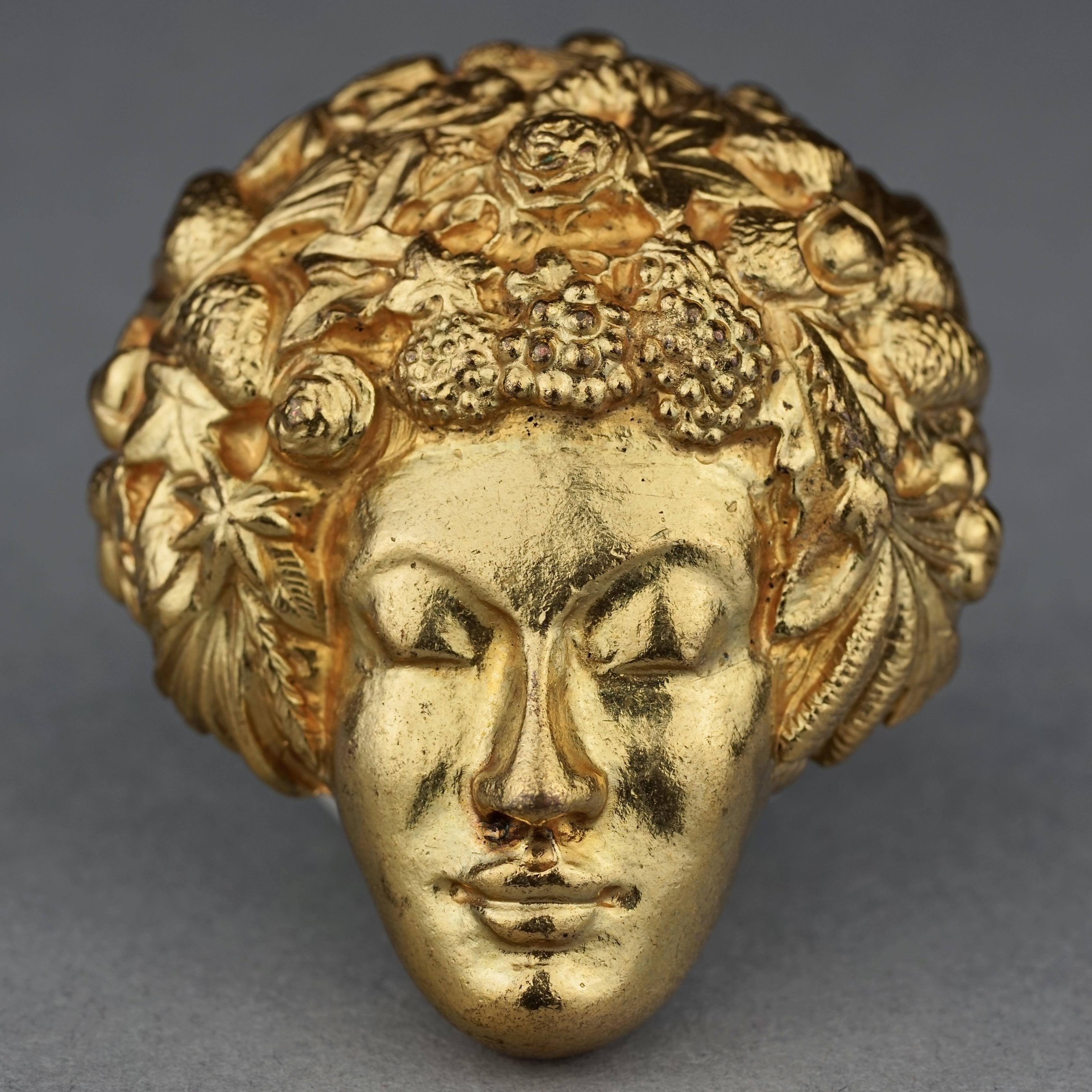 Vintage ISABEL CANOVAS Intricate Lady Face Brooch 

Measurements:
Height: 2.16 inches (5.5 cm)
Width: 1.77 inches (4.5 cm)

Features:
- 100% Authentic ISABEL CANOVAS.
- 3 dimensional sculpted face with novelty hair.
- Gold tone.
- Signed ISABEL