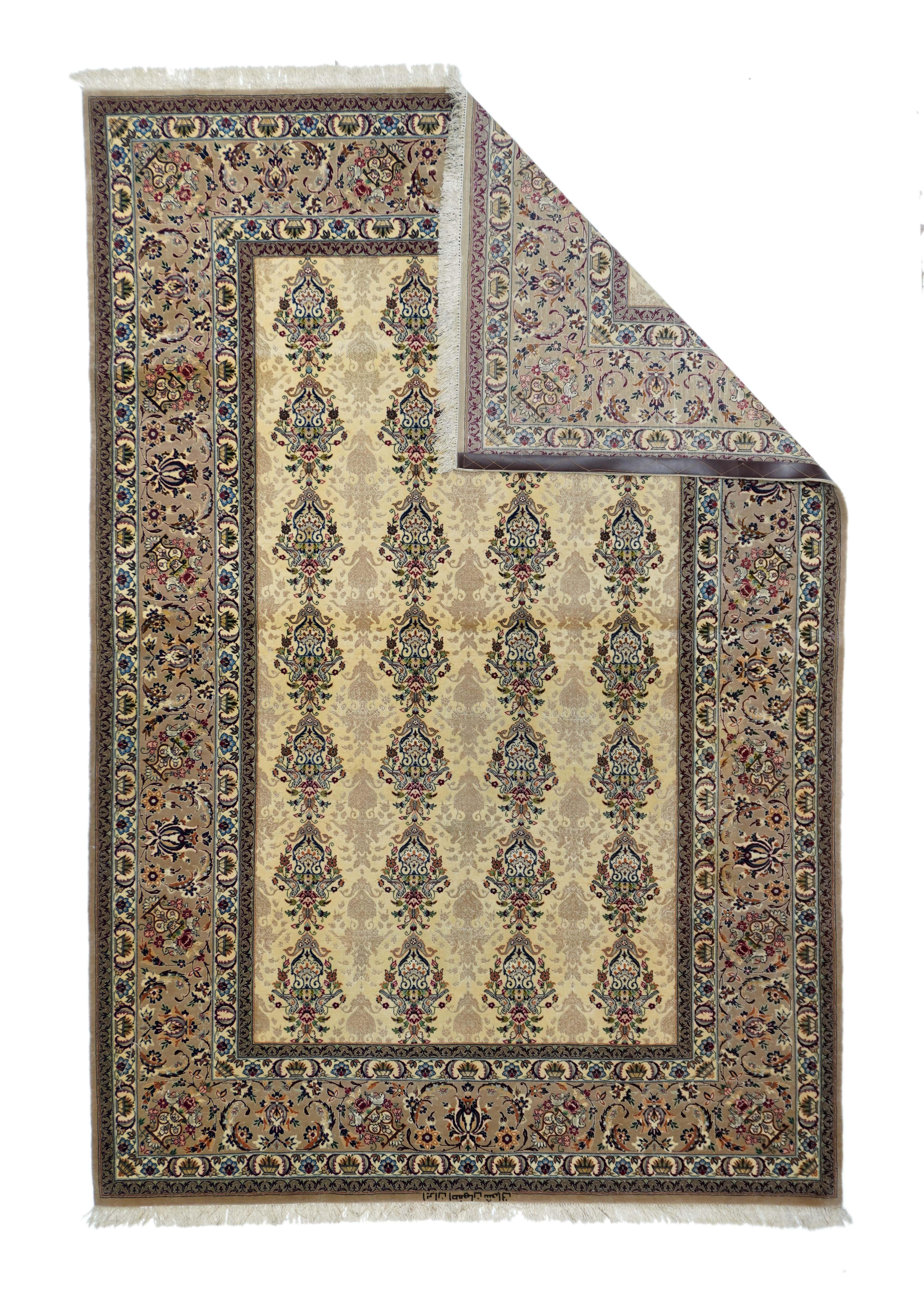 Vintage Isfahan Rug 5'1'' x 7'6''. Not the classic medallion Isfahan's from Central Persia, but as textile-inspired, finely woven, top condition piece with a four by seven repeating vase, paired bird and bouquet major pattern and a tonally subdued