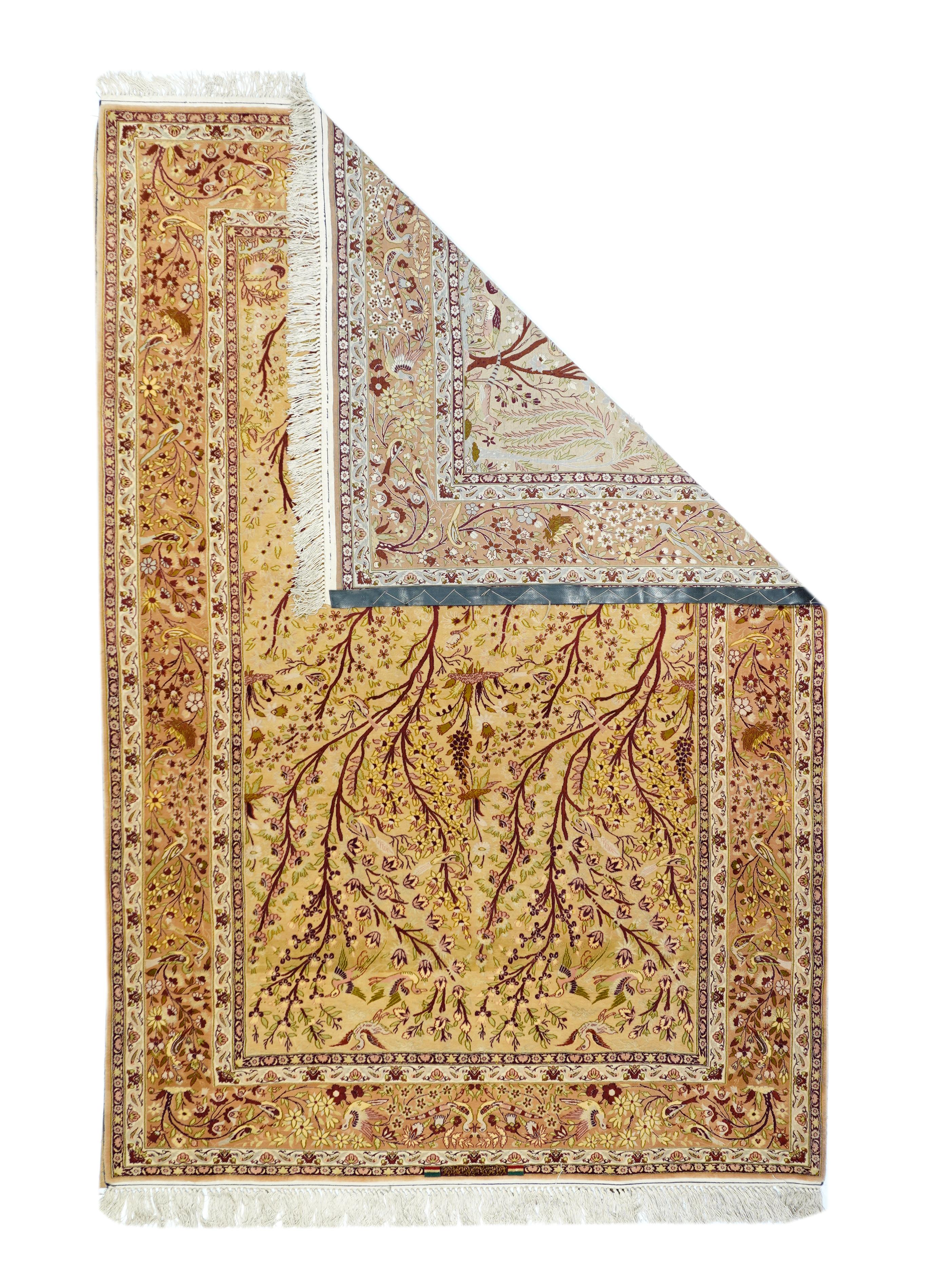 Vintage Isfahan Rug 5'1'' x 7'7''. Two identical trees swerve and bend in an imaginary breeze up the straw-sand field of this urban, finely woven city scatter. Tiny birds twitter among the branches. Birds also accent the budding meander of the