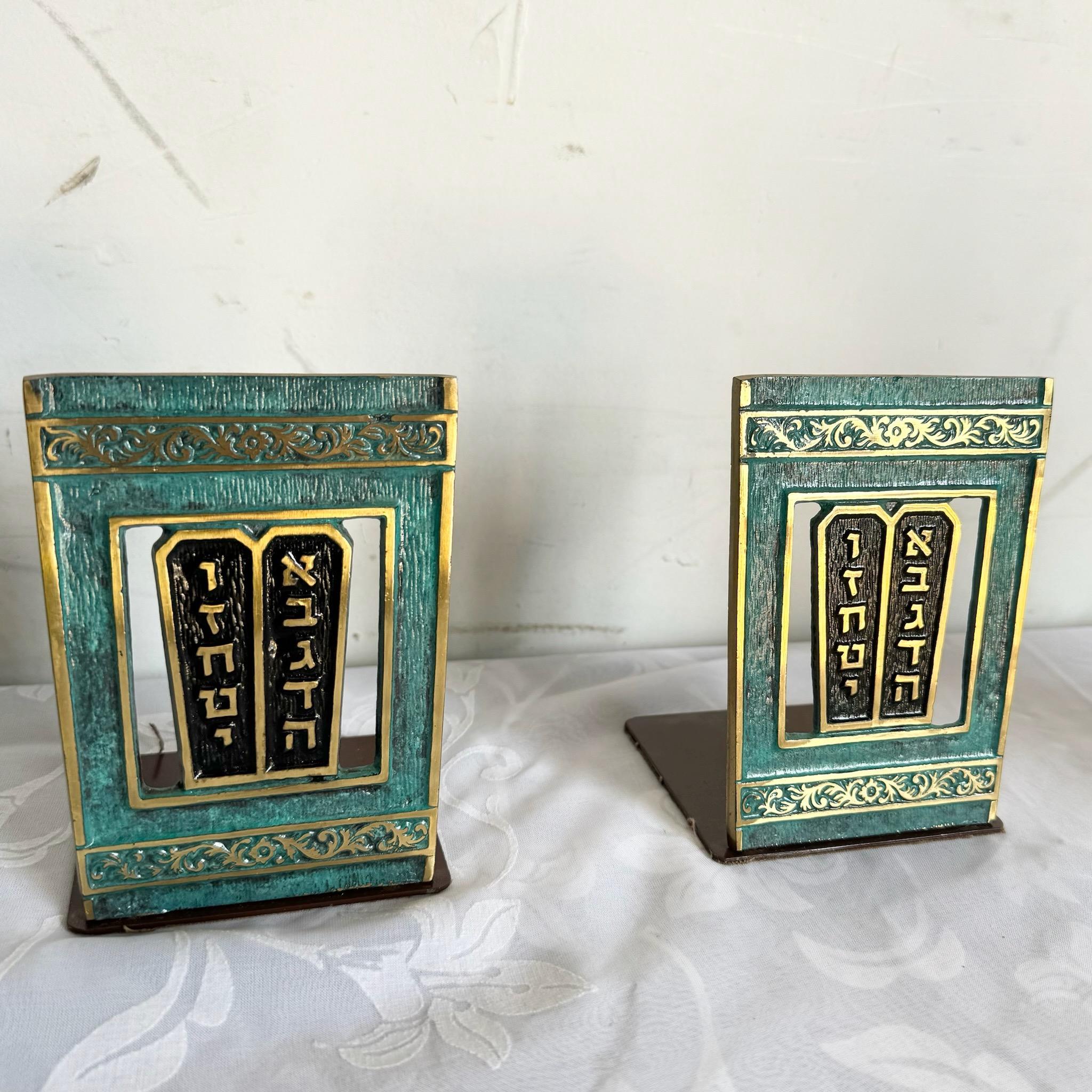 This pair of vintage Israeli Ten Commandments bookends combines spiritual significance with functional design. Crafted from brass, these bookends offer a timeless way to organize your collection while adding a touch of Judaica to your space.
