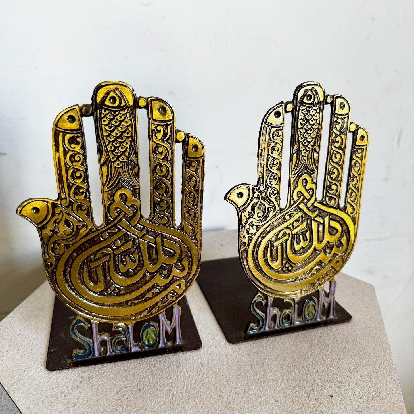 Pair of Vintage Israeli brass Hamsa bookends featuring 