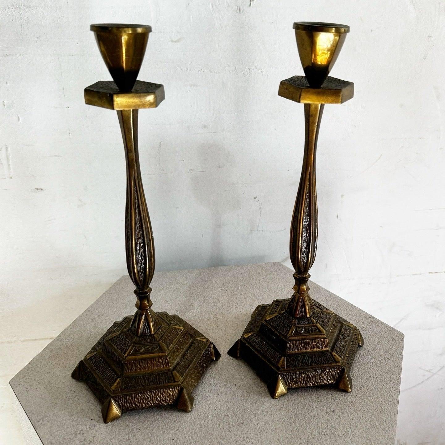 Vintage Israeli Brass Shabbat Holders with intricate designs and polished brass finish. Perfect for Shabbat observance or elegant home decor.
 
 We sell items as acquired, without restoring or repairing. Vintage pieces may have age-related wear.