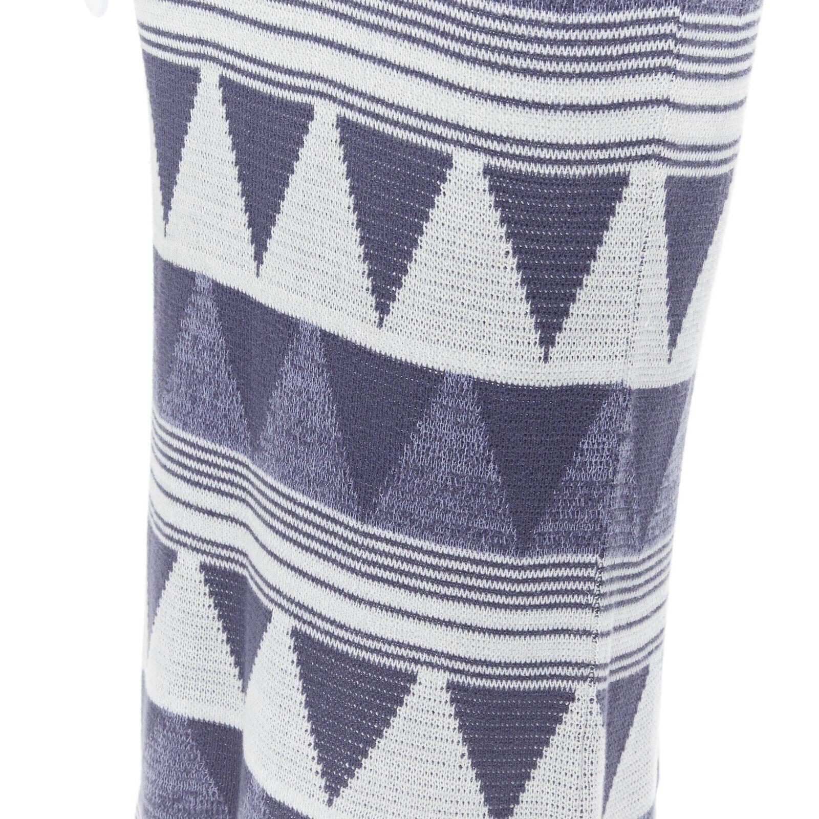 vintage ISSEY MIYAKE 1980's ethnic blue grey geometric wool knit midi skirt M
Reference: CRTI/A00280
Brand: Issey Miyake
Model: Wool skirt
Collection: 1980s
Material: Wool
Color: Blue
Pattern: Geometric
Extra Details: Elasticated stretch waist.
Made