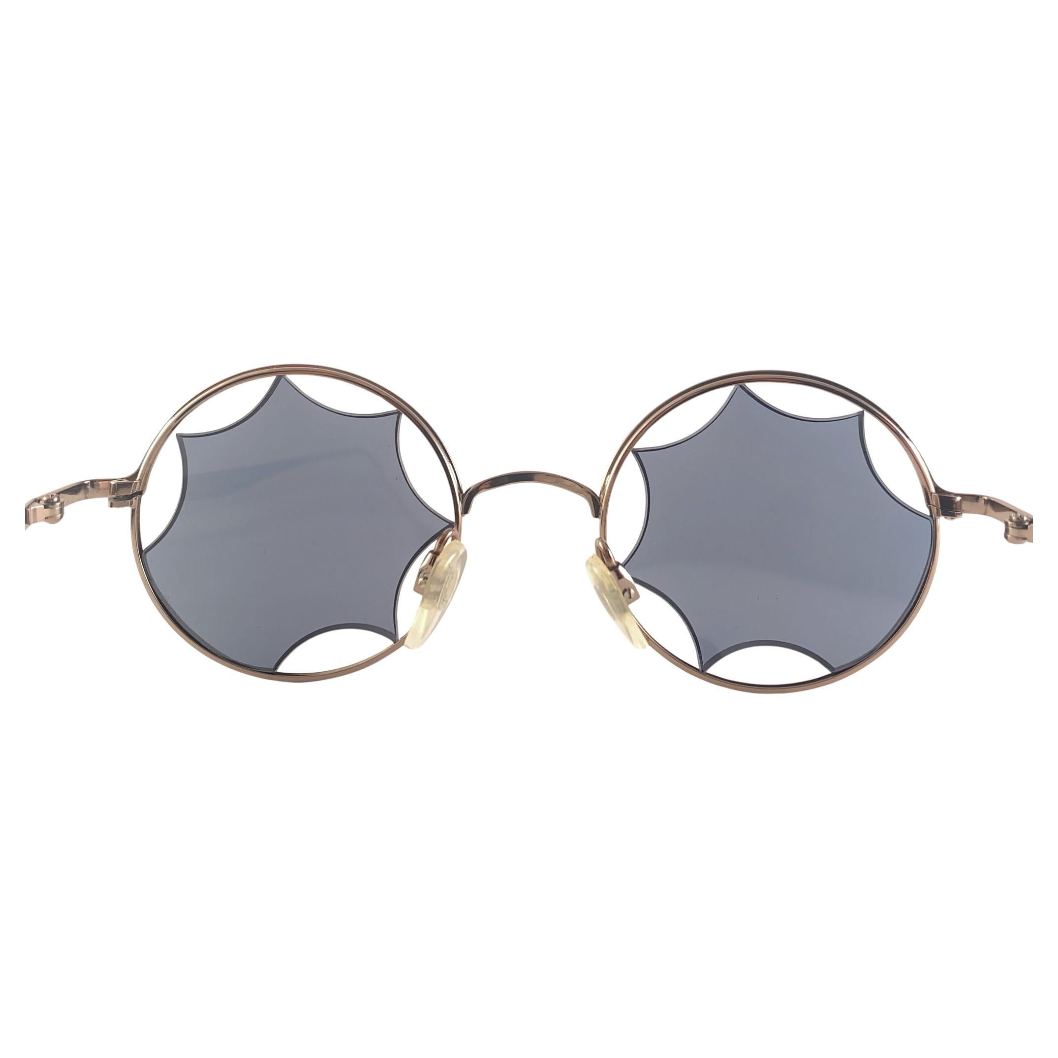 Rare Pair Of Vintage Issey Miyake Im 401 Spiderwb Like Cut Out Lenses On A Silver Matte  Frame.
After Almost 40 Years, Issey Miyake Designed And Produced In The 1980'S Still Remains One Of The Most Iconic Pieces Of Eyewear & Fashion History

This