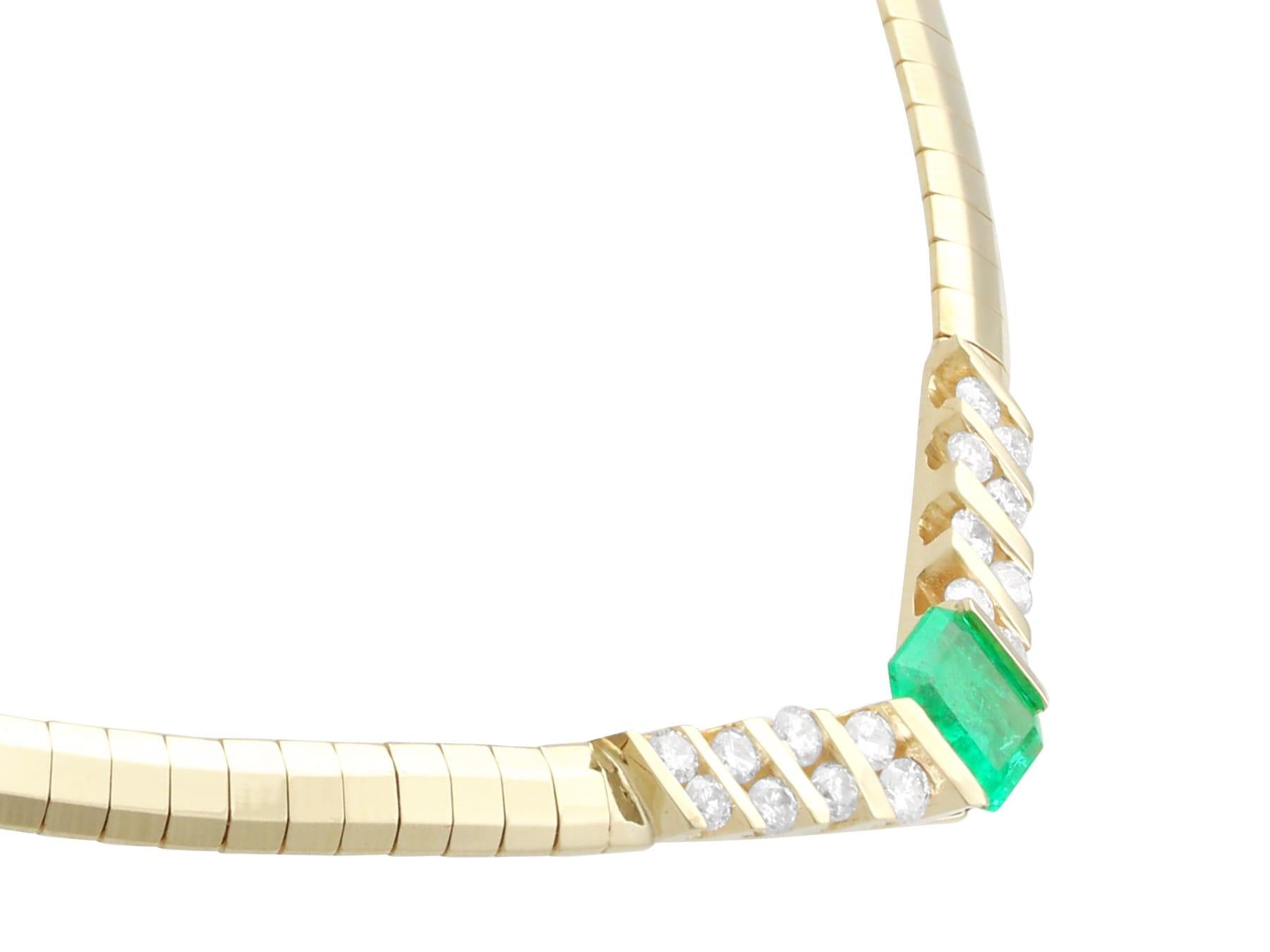A stunning, fine and impressive vintage 0.95 carat emerald and 0.45 carat diamond, 14 karat yellow gold necklace; part of our diverse necklace collection.

This stunning, fine and impressive vintage necklace has been crafted in 14 karat yellow