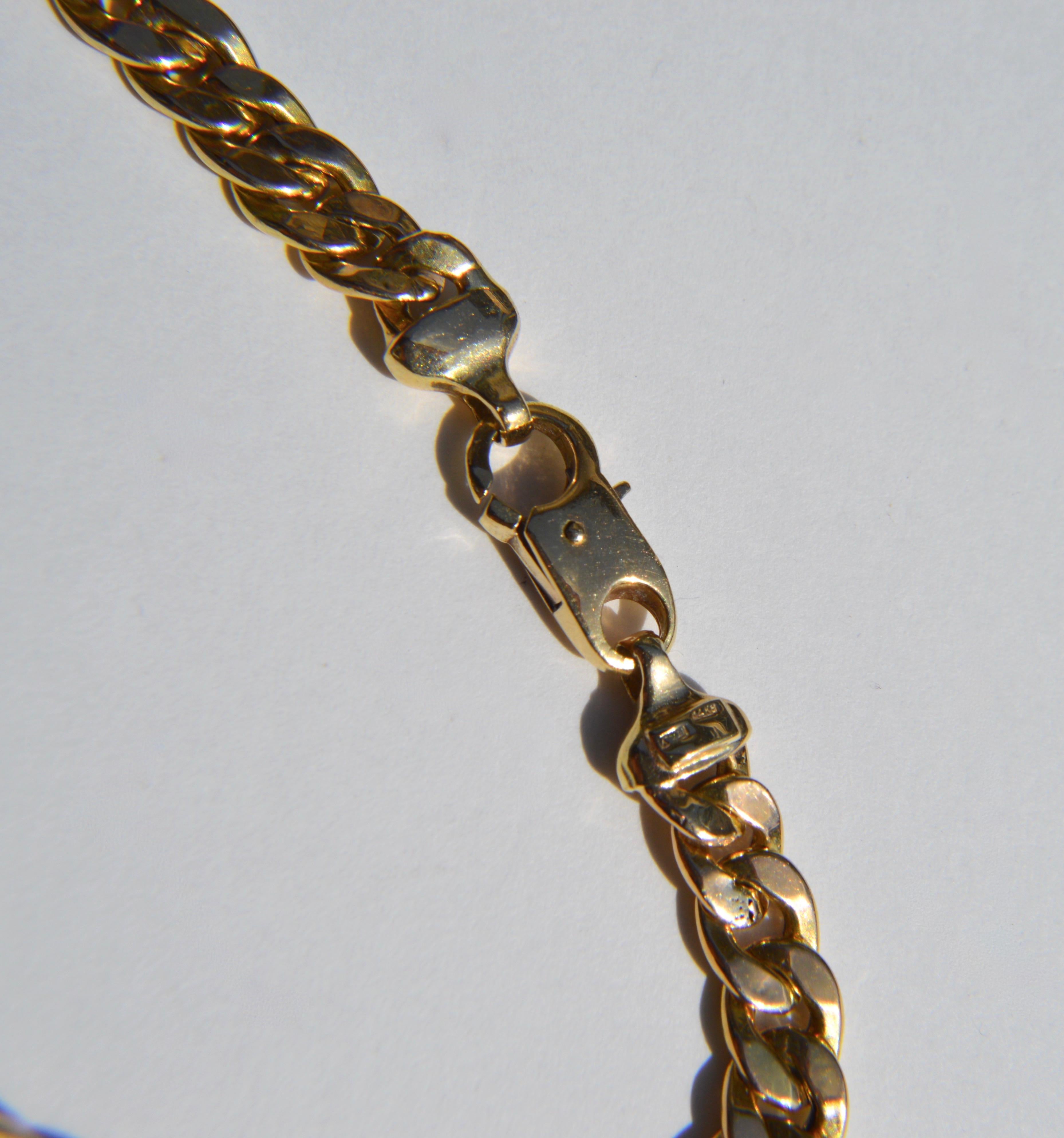 Stunning vintage circa 1970s 14K yellow gold cuban link curb chain choker necklace. 14.5