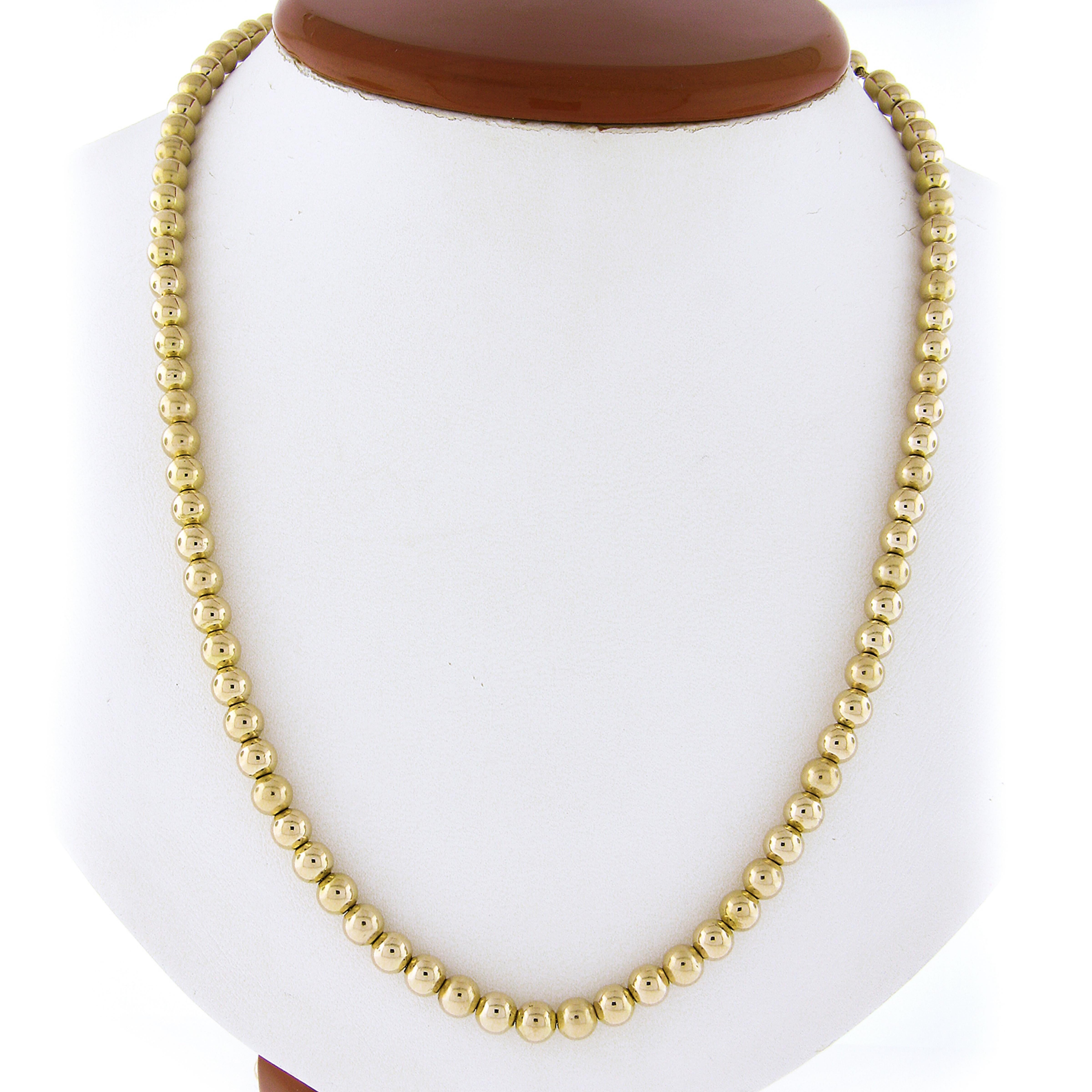 This Italian vintage well made polished bead/ball on a wheat link chain necklace is crafted in solid 14k yellow gold. The necklace is 31 inches long, 5.15mm thick, and is secured with a sturdy lobster claw clasp that ensures safe wear. Perfect for