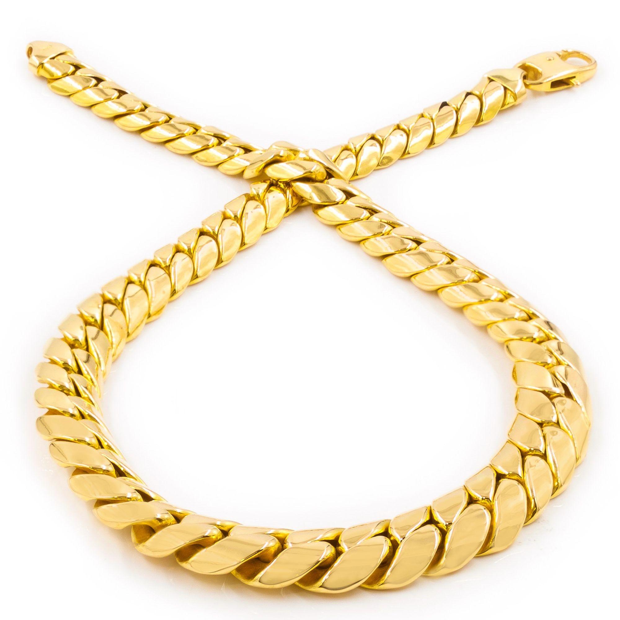 Entirely executed in 14 karat yellow gd with a brilliant-pish, this slinky necklace is composed of graduated hlow cast links set in a herringbone pattern affixing with a lobster clasp. It weighs in at an overall hefty 49.1 grams and wears
