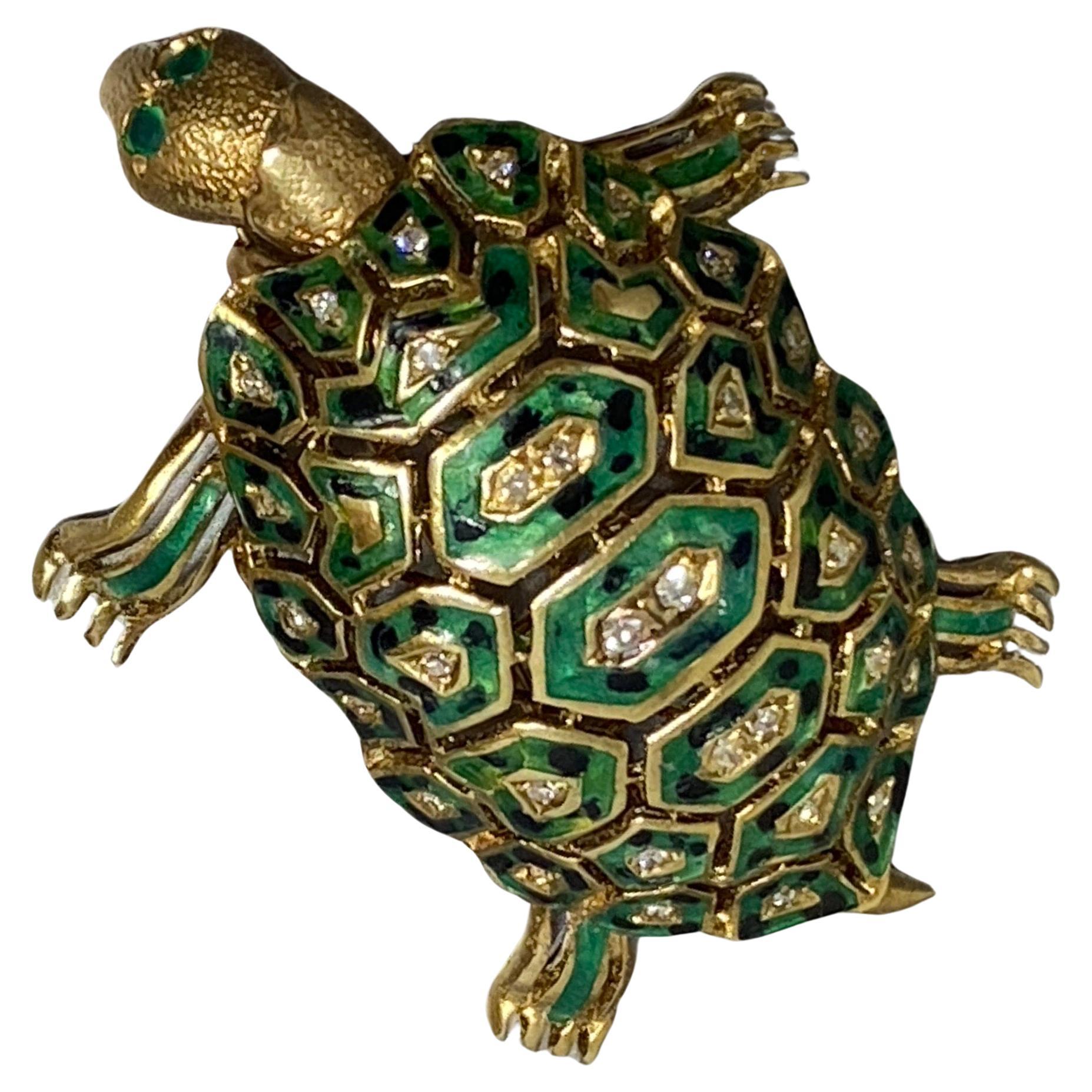 This delightful Italian turtle brooch, pin is finely crafted in 14k yellow gold and would make a fantastic edition to any neckline.
The turtle shell is adorned with green and blue enameling and accented with single cut diamonds.
Charming moving head