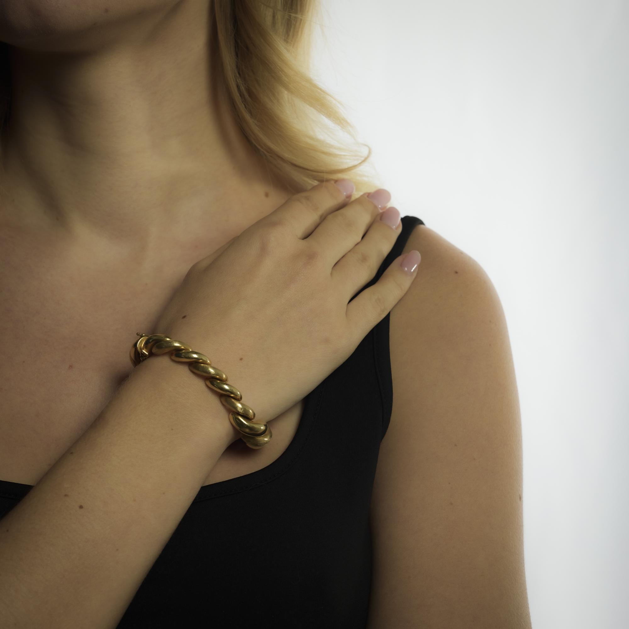 This vintage 1970’s Italian bracelet is crafted in bold 14k yellow gold, offering a substantial weight and refined craftsmanship that make it both elegant and versatile.