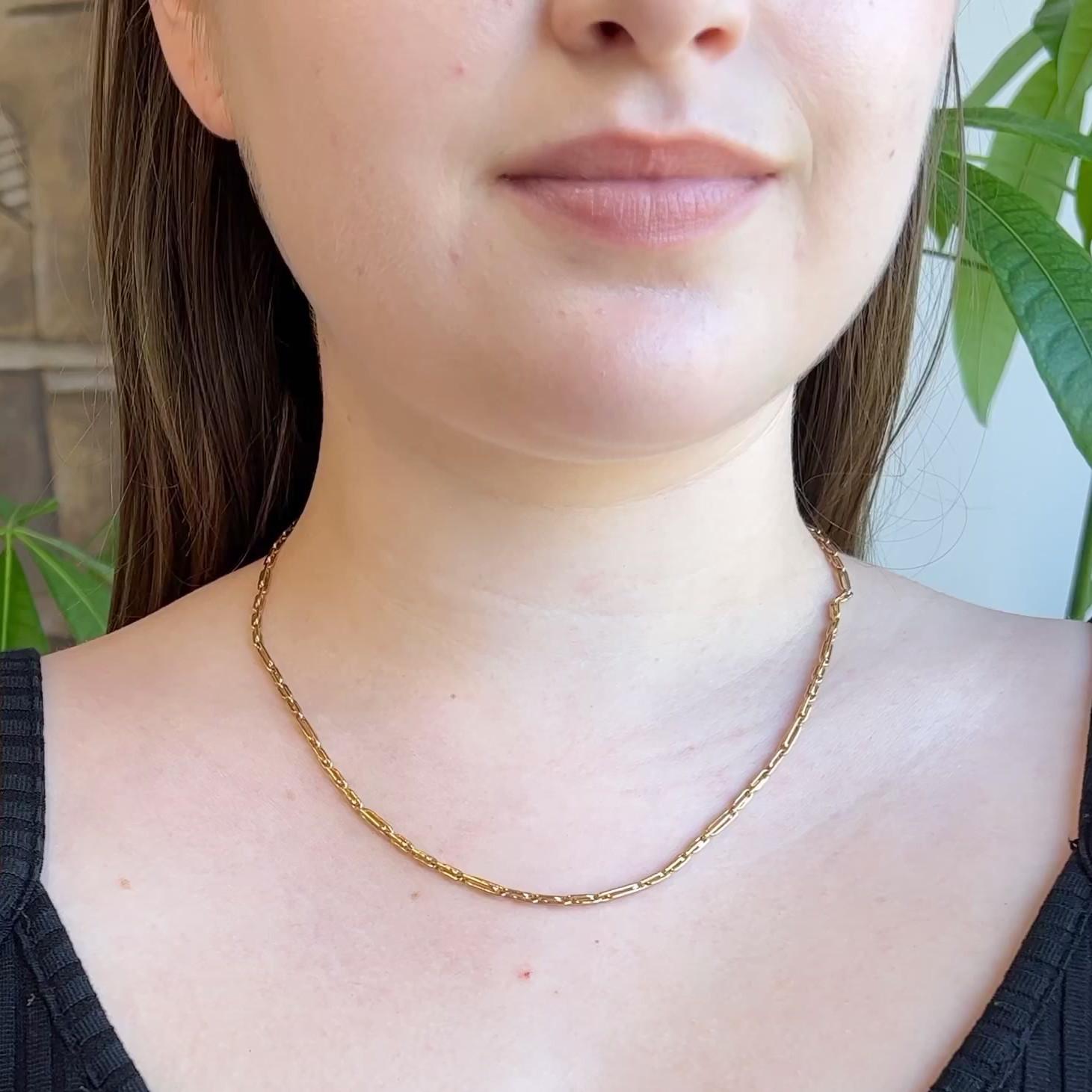 One Vintage Italian 18 Karat Yellow Gold Paperclip Link Chain Necklace. Crafted in 18 karat yellow gold with Italian hallmarks. Circa 1980. The necklace is 18 1/2 inches in length.

About this Item: Adorn your neck with sleek gold when you wear this