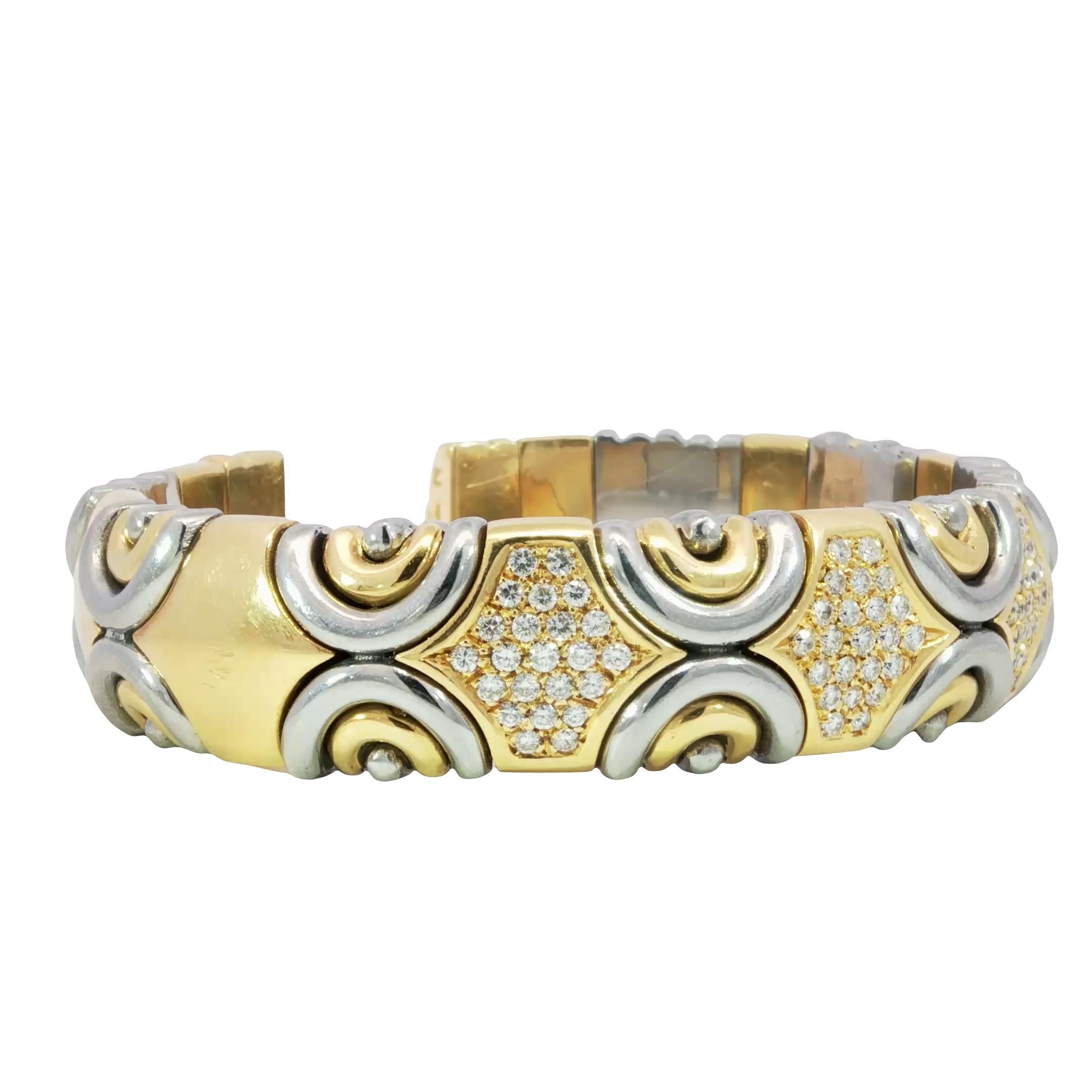 Vintage Italian 18K Diamond Cuff Bracelet Gold & Steel by Acciaio Foro ~1.87ctw

This stunning cuff bracelet showcases a harmonious blend of 18k gold and sterling silver, graced with round white diamonds. The intricate design features alternating