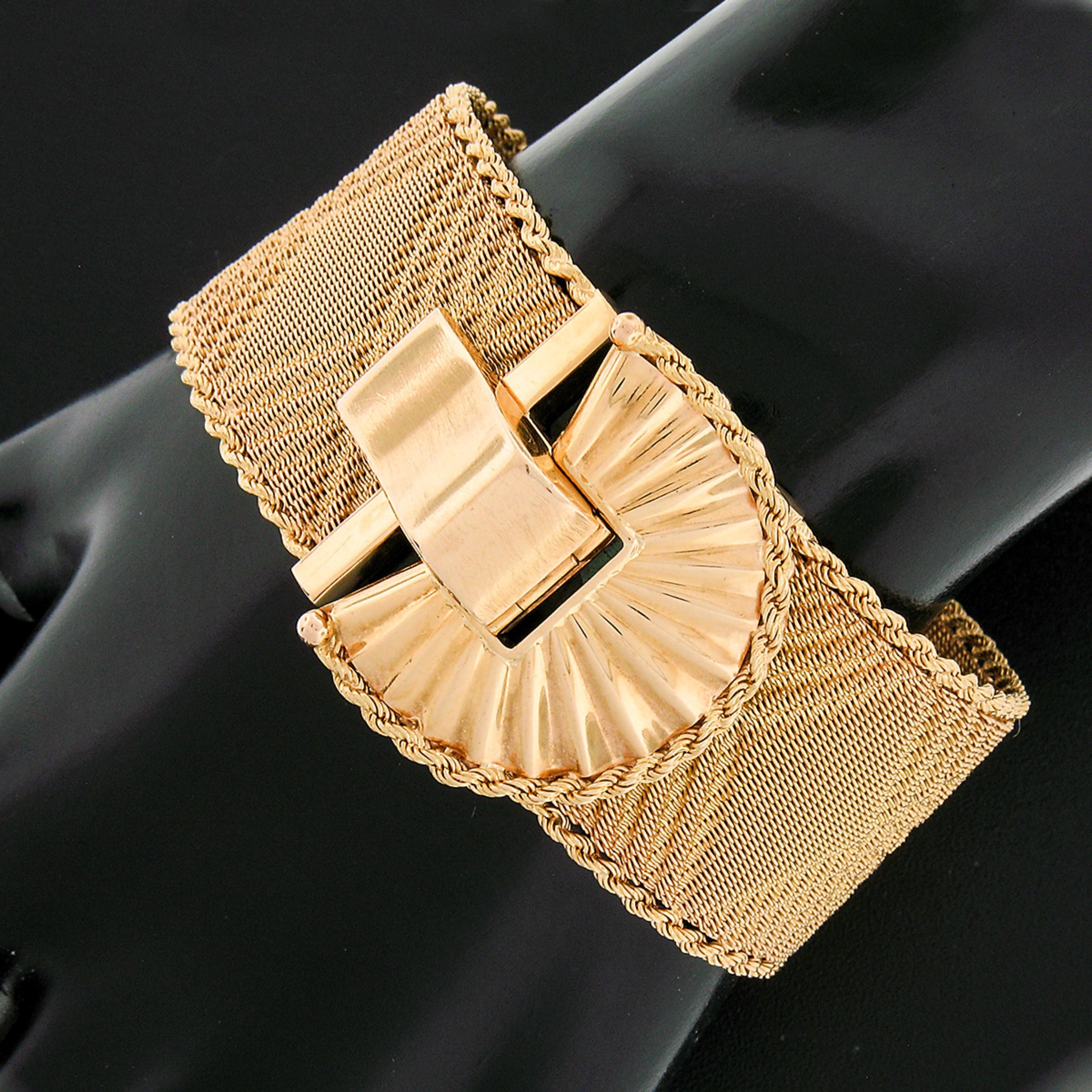 You are looking at a magnificent vintage strap bracelet that was crafted in Italy from solid 18k yellow gold. This wide strap is very well constructed from woven mesh with a silky and super flexible feel on the wrist. The mesh strap is embedded with