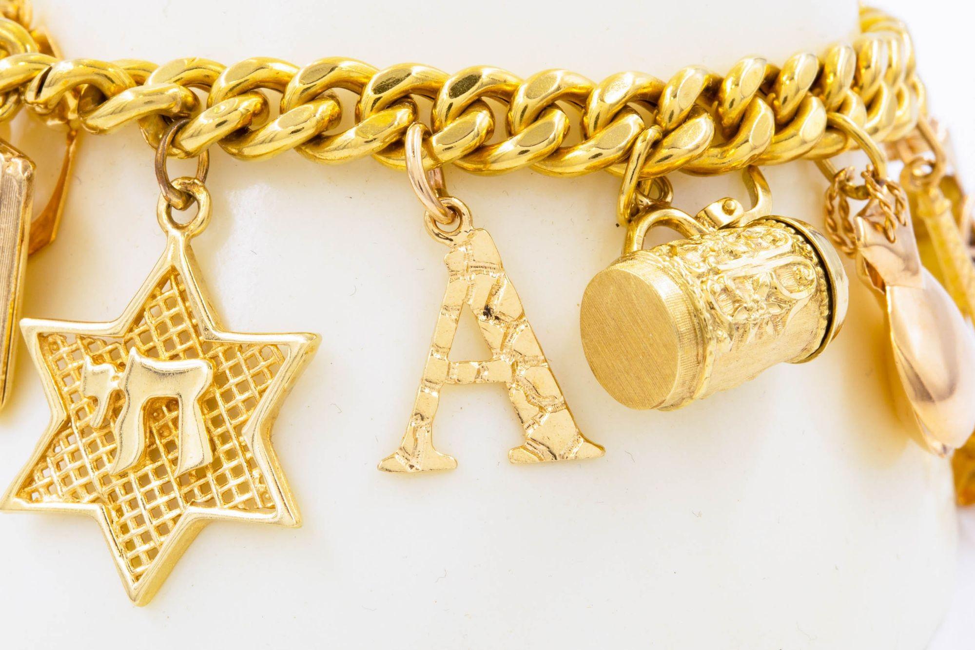 Vintage Italian 18k Gold Bracelet with 14k Gold Charms by Uno-a-Erre 13