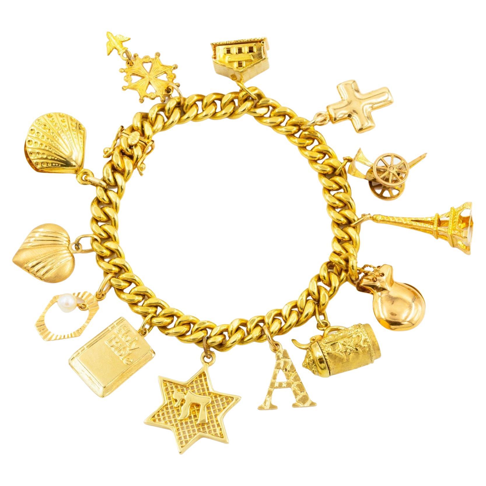 Vintage Italian 18k Gold Bracelet with 14k Gold Charms by Uno-a-Erre