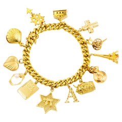 Uno-a-Erre Bracelet italien vintage en or 18 carats avec breloques en or 14 carats