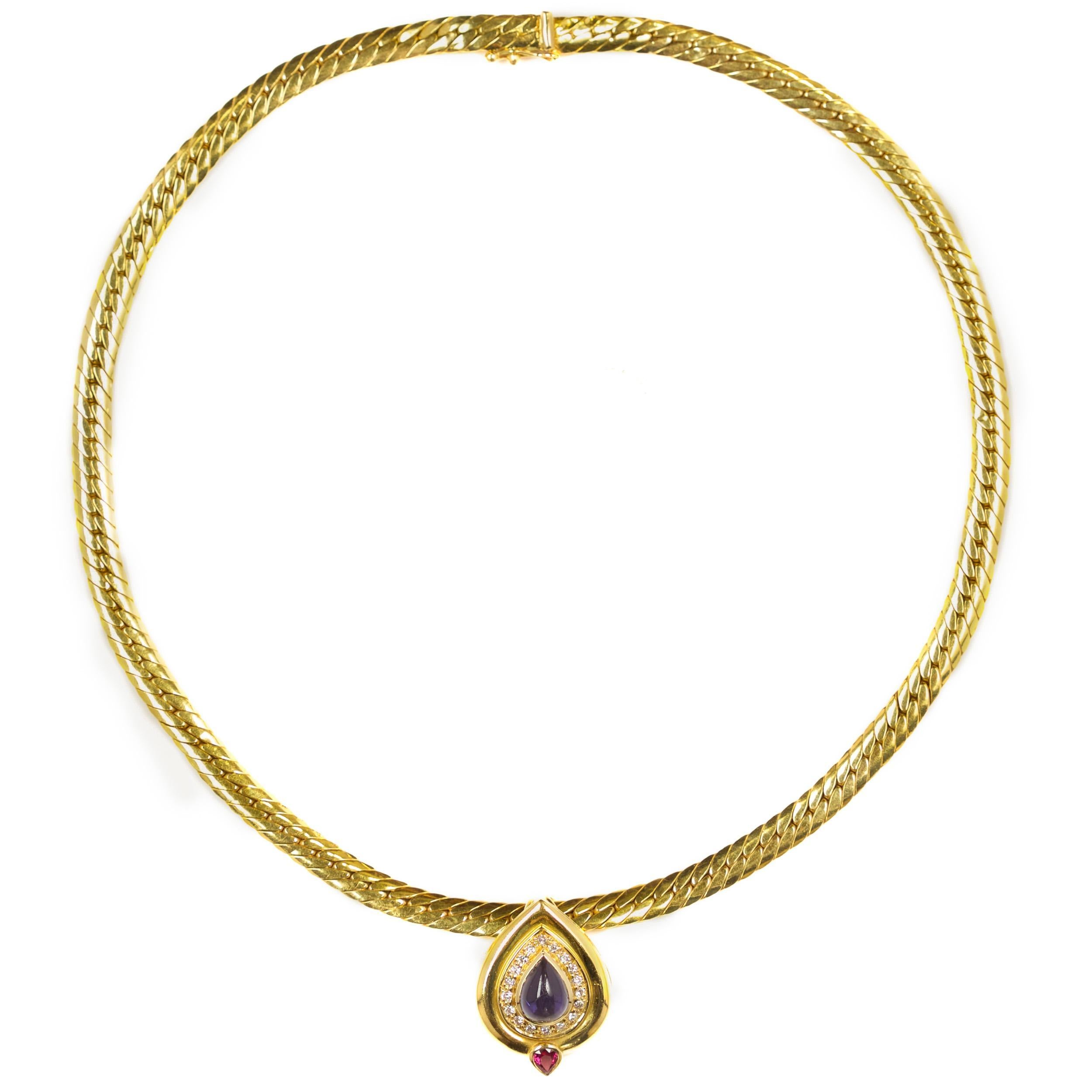 A refined necklace with a fine high-polish to the angular links, the piece is set apart with its teardrop pendant with its translucent purple polished cabochon surrounded by eighteen round-cut diamonds over an inverted pear-cut ruby. This slides