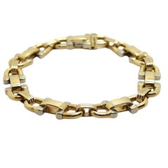 Bracciale a staffa bicolore italiano d'epoca a 18 carati