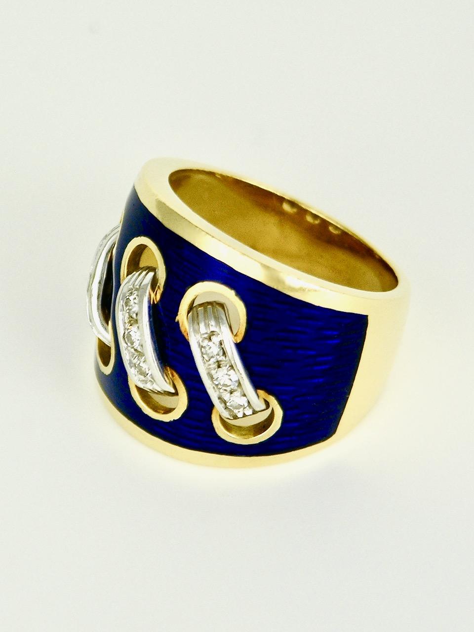 A vintage ring of an unusual design with an 18k yellow gold wide tapered band with three narrow diamond set laces wrapping through six eyelets on a ground of rich cobalt blue enamel - such a unique and quirky ring is sure to make an eye catching