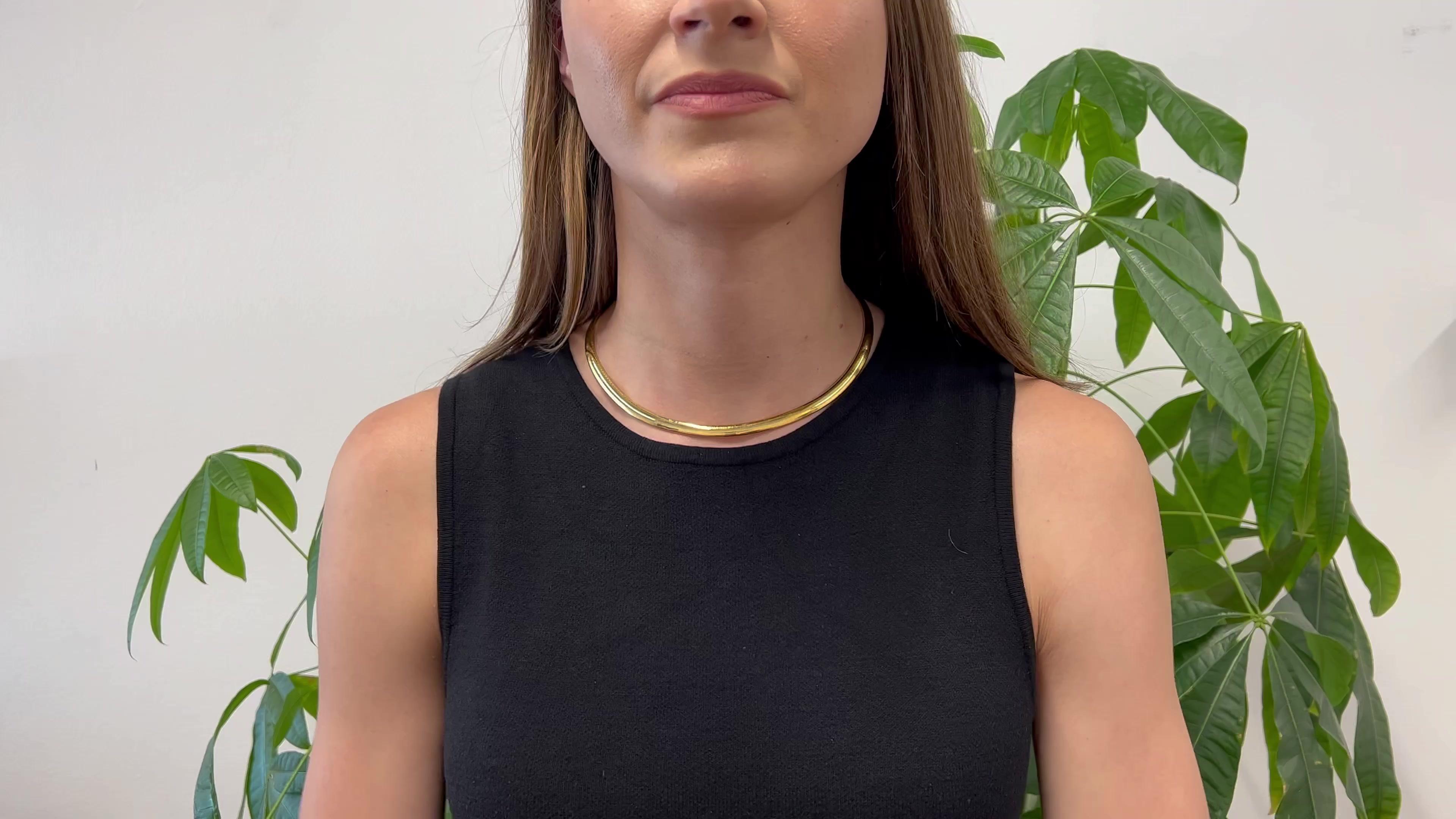One Vintage Italian 18k Yellow Gold Flat Omega Chain Choker Necklace. Crafted in 18 karat yellow gold with Italian hallmarks, weighing 43.93 grams. Circa 1980. The necklace is 16 ½ inches in length.

About this Item: There's never a wrong time for