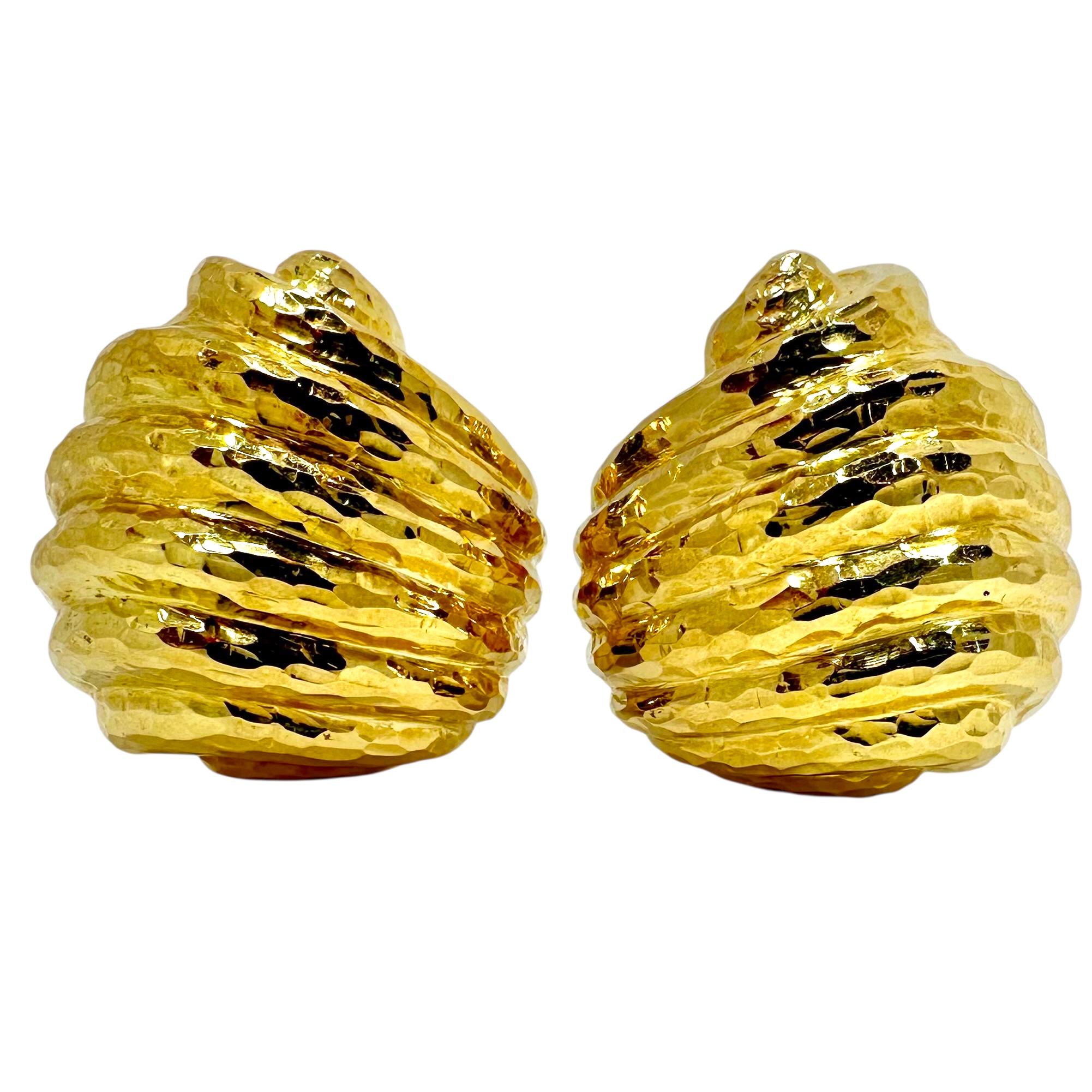 This very dimensional pair of vintage Italian hallmarked, 18K yellow fluted vintage earrings are meticulously crafted. Each earring measures 1 1/8 inches by 1 1/4 inch and is deeply hammered over all forward surfaces. Maximum height above the ear