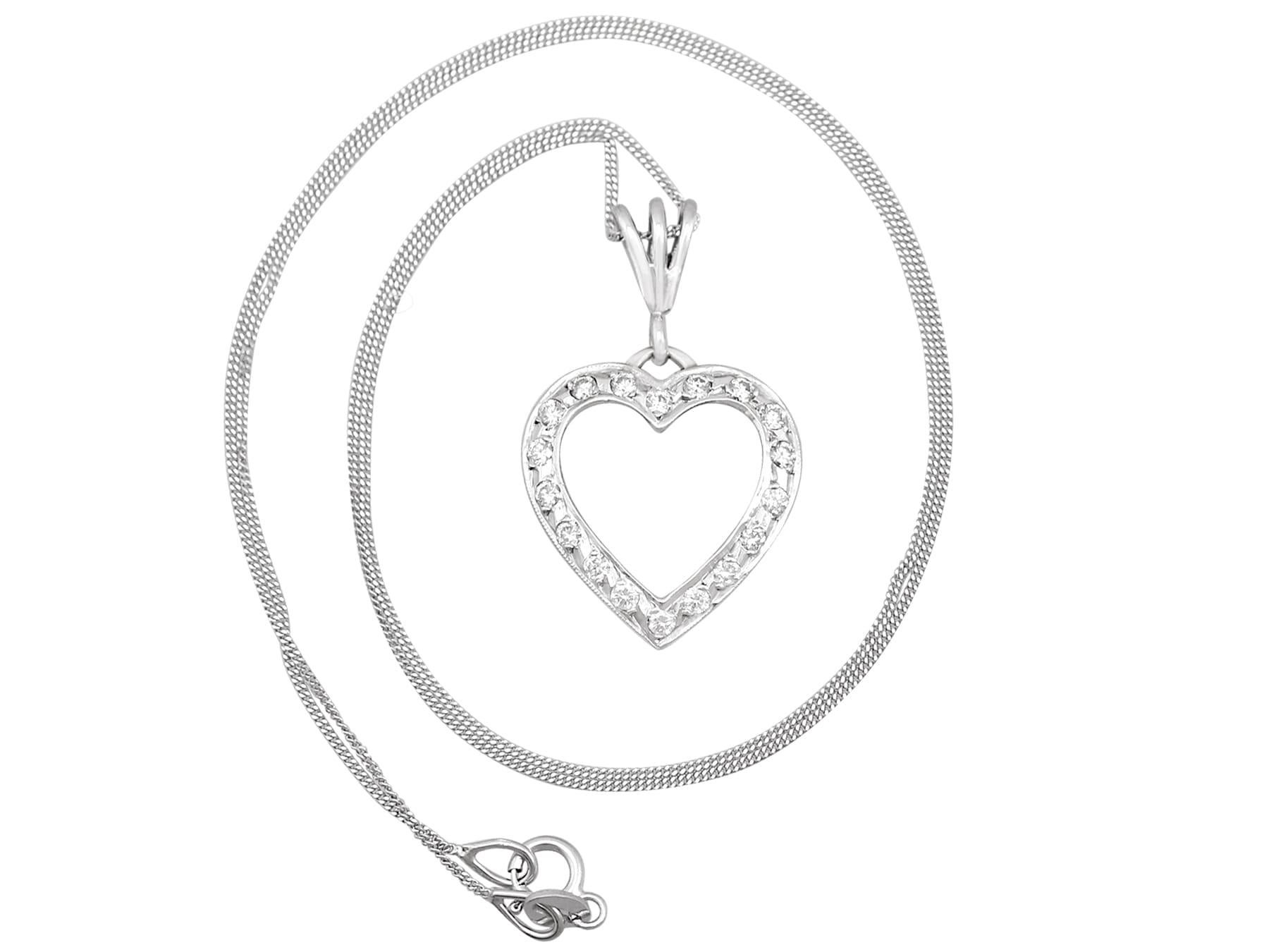 An impressive vintage 1960s Italian 0.28Ct diamond and 18k white gold heart shaped pendant; part of our diverse vintage jewelry and estate jewelry collections.

This fine and impressive 1960s heart pendant has been crafted in 18k white gold.

The