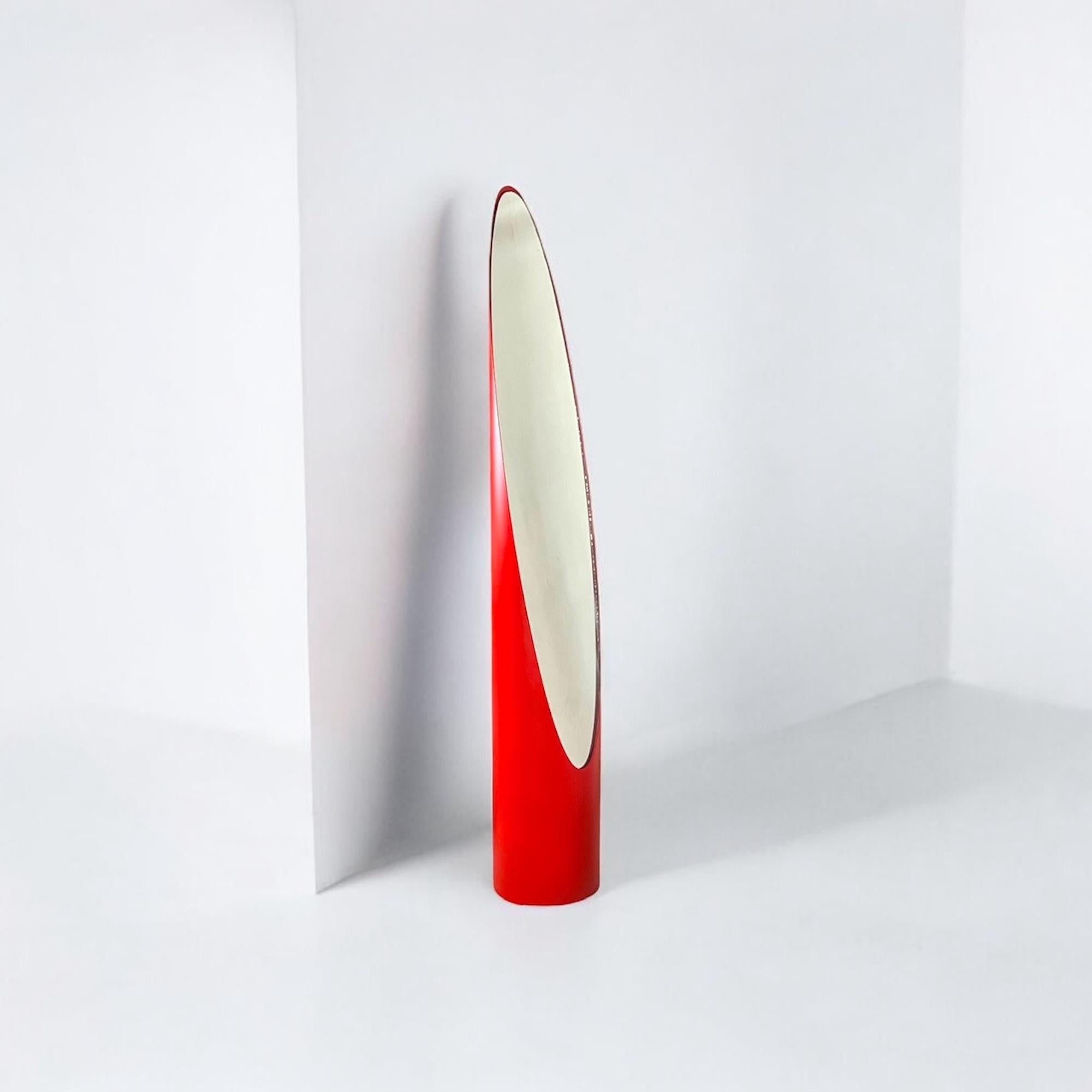 The Lipstick Mirror is a hallmark of 1970s Italian design, crafted in the style of Rodolfo Bonetto’s renowned aesthetic. Its vertical form, inspired by the shape of a lipstick—known as Unghia in Italian—merges clean lines with bold retro