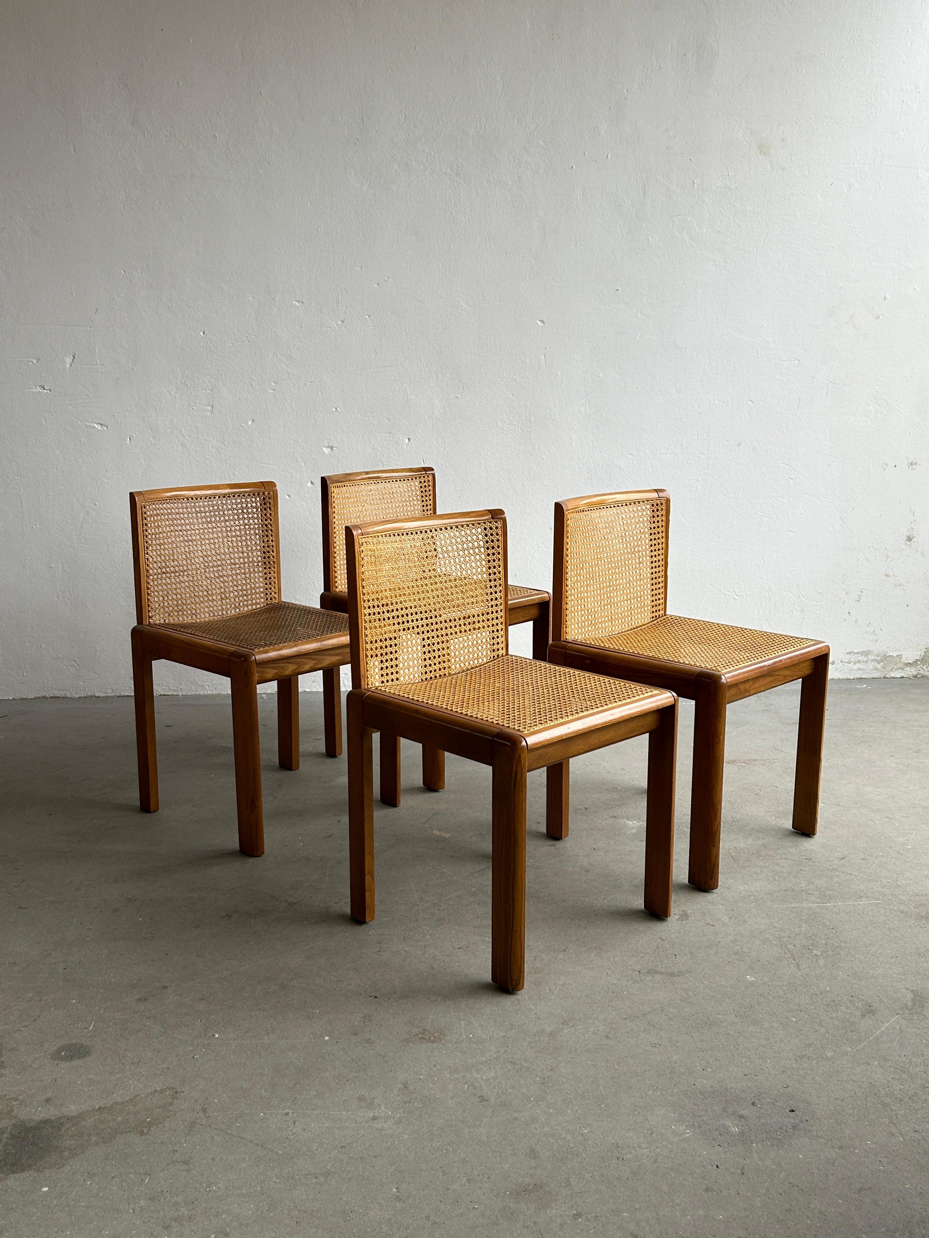 Beautiful and elegant wood and cane Mid-Century-Modern dining chairs. Italian elegant and simple chairs with a weaved cane seat and back. Would fit well in a natural soft interior with nude tones and hints or rustic modern influences.
Produced