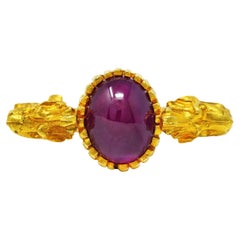 Vintage Italian 3.00 Carats Ruby Cabochon 18 Karat Yellow Gold Gargoyle Ring
