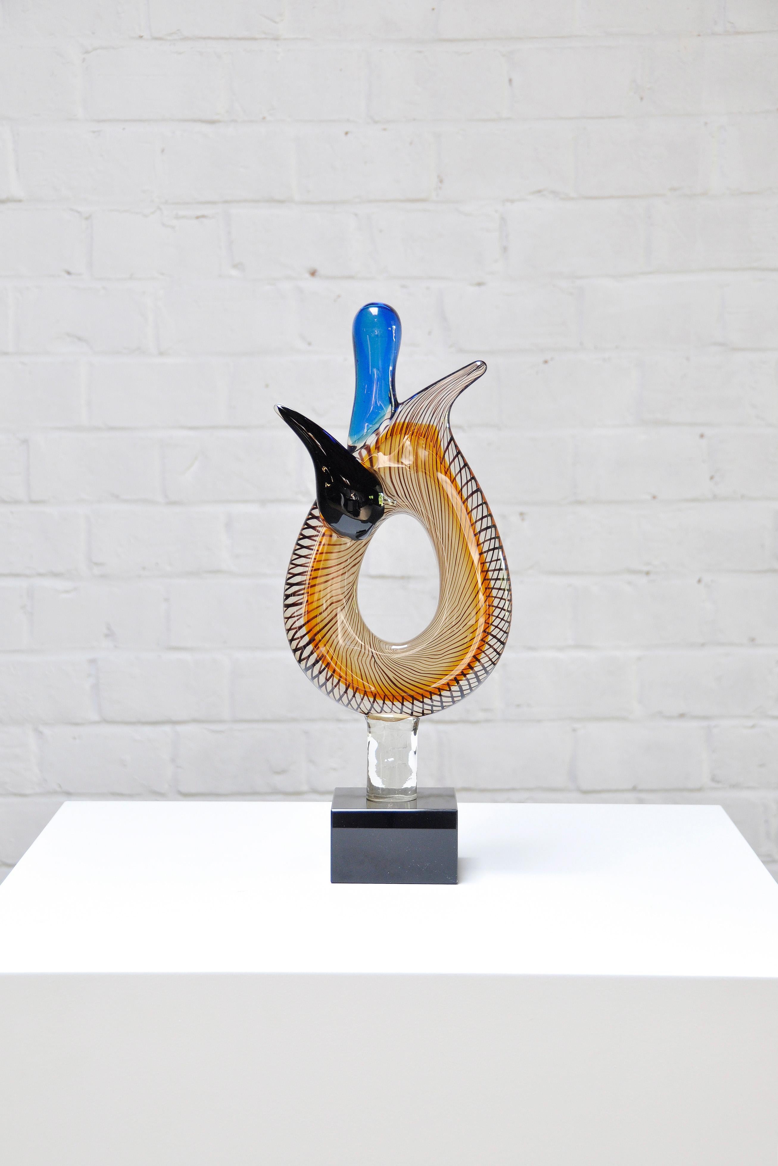 Fantastic and unusual 1980's abstract sculpture in venetian murano glass with blue, azure, soft orange and black tones. Extremely fine production details, attributed to Alberto Dona but no signature found. In perfect mint condition, no damages.